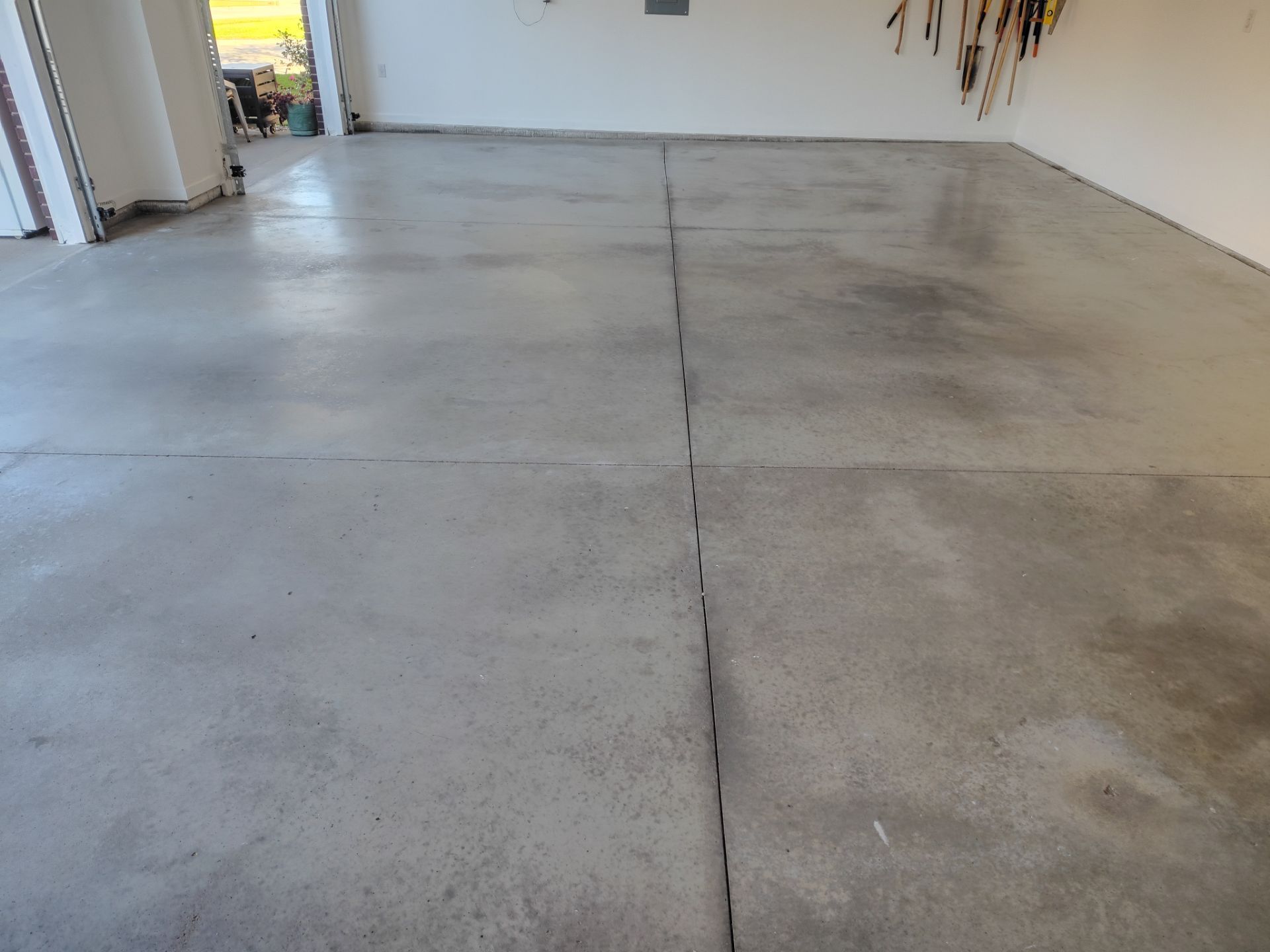 New Johnston Garage Resurfacing by Revival Concrete Coatings, LLC