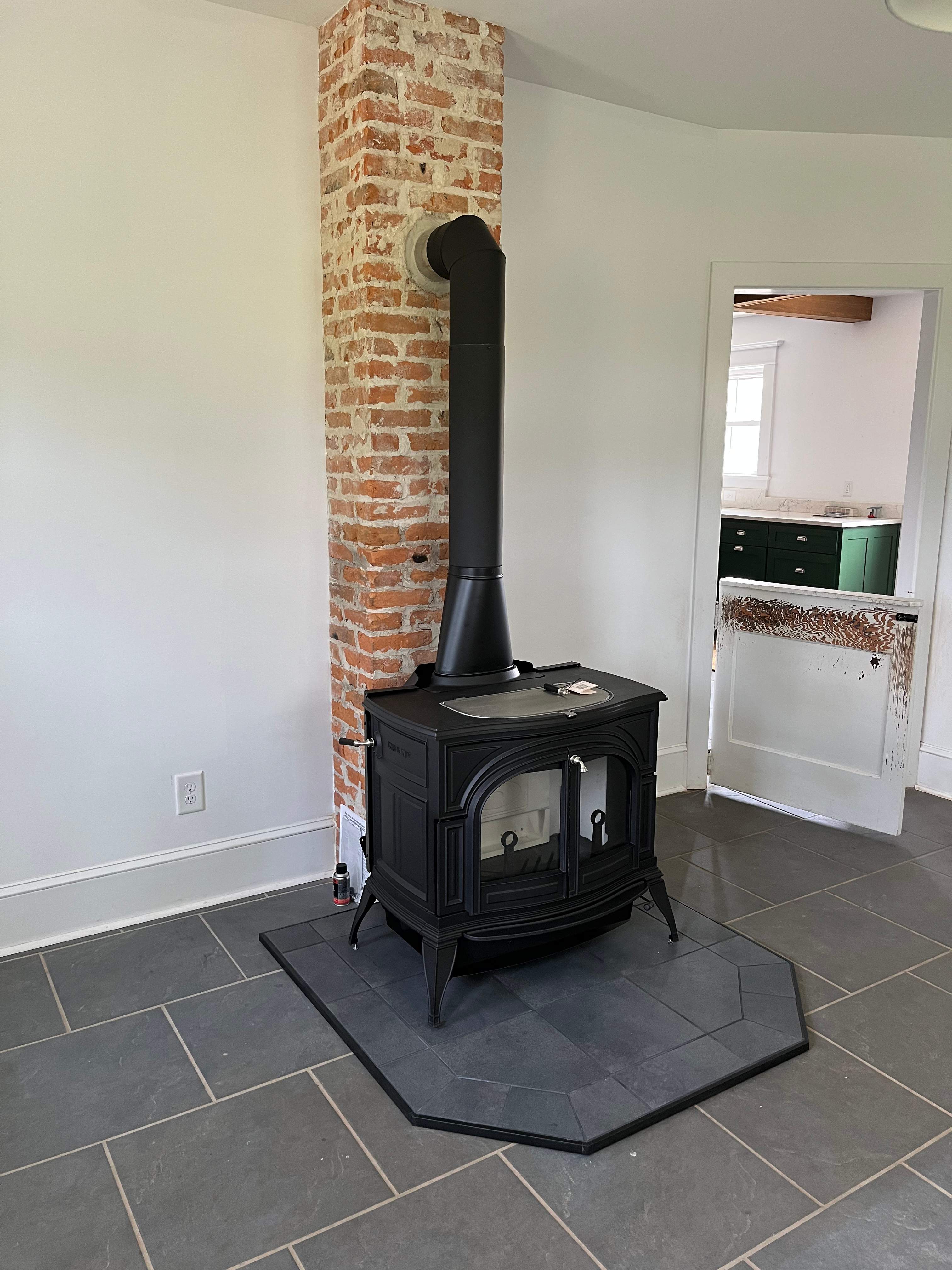 Wood Stove Installation and Fireplace Build by Premier Chimney and Roofing