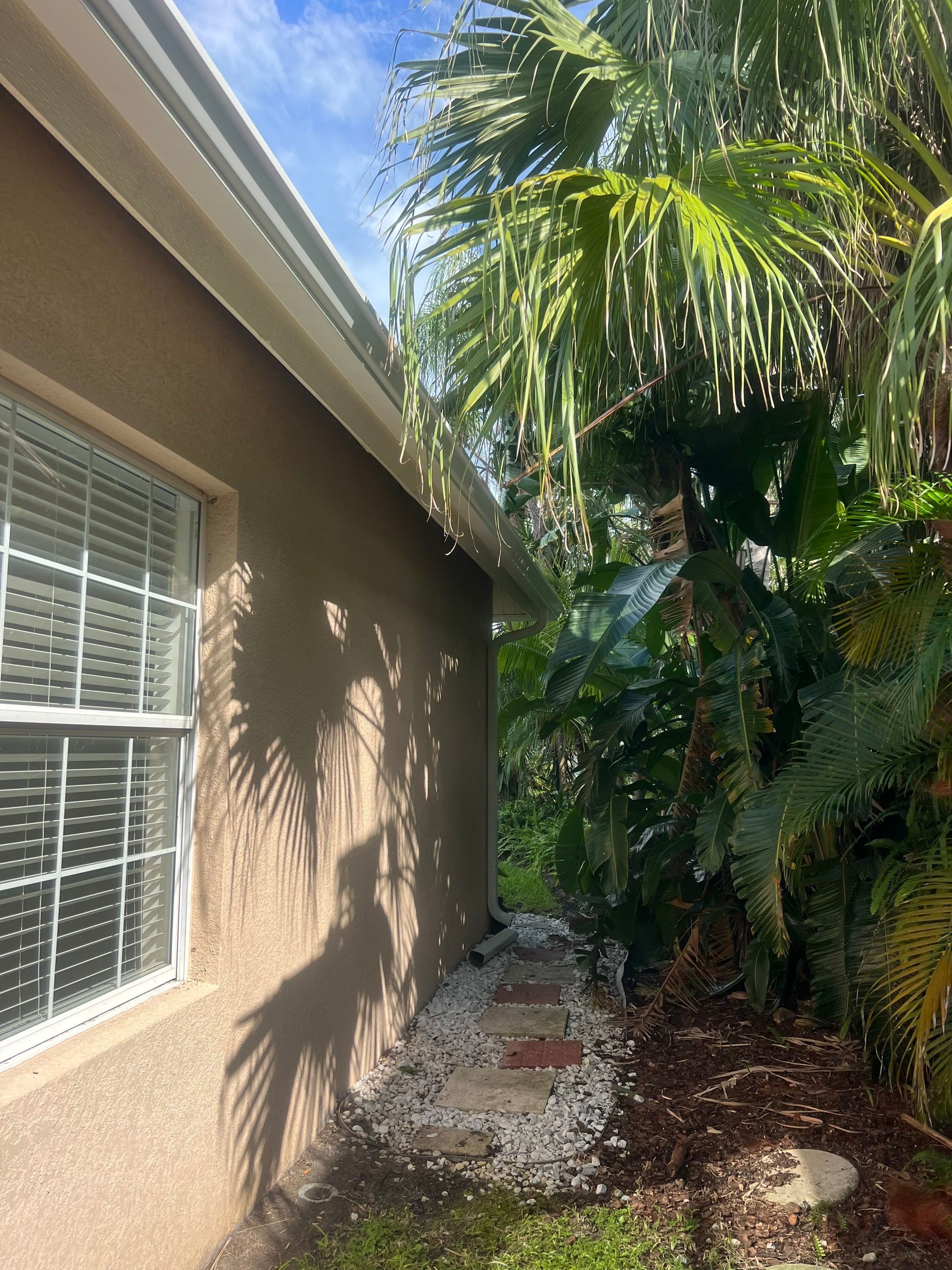 White Gutters and White Downspouts by Gutter Professors