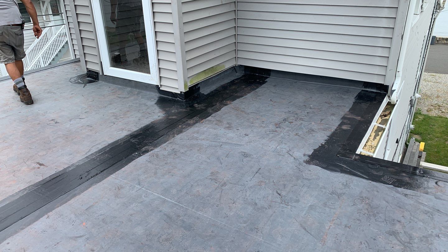 Deck Installation using trex over epdm roof by A Plus Exterior