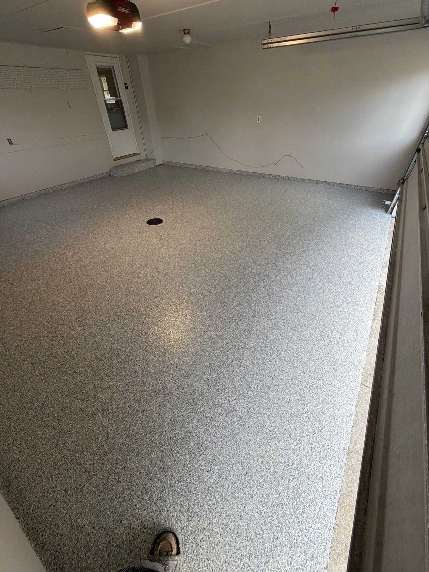 Muskegon Garage Interior Painting and Epoxy Flake Floor Installation by Gordon Painting