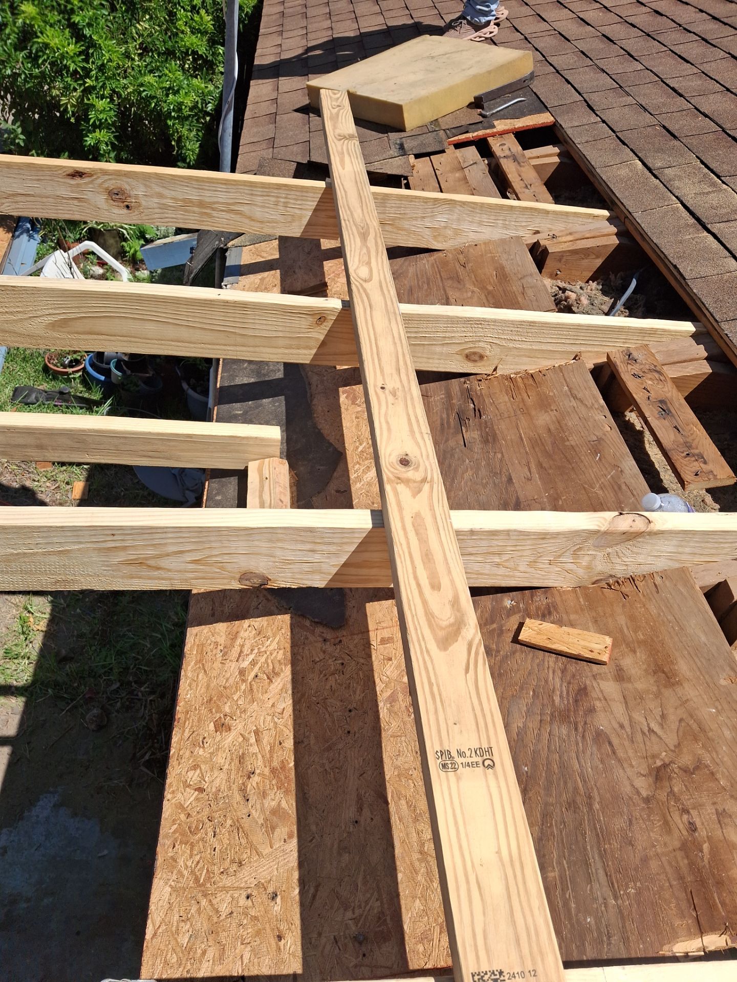 Chimneys need a Cricket.  by Bayfront Roofing and Construction