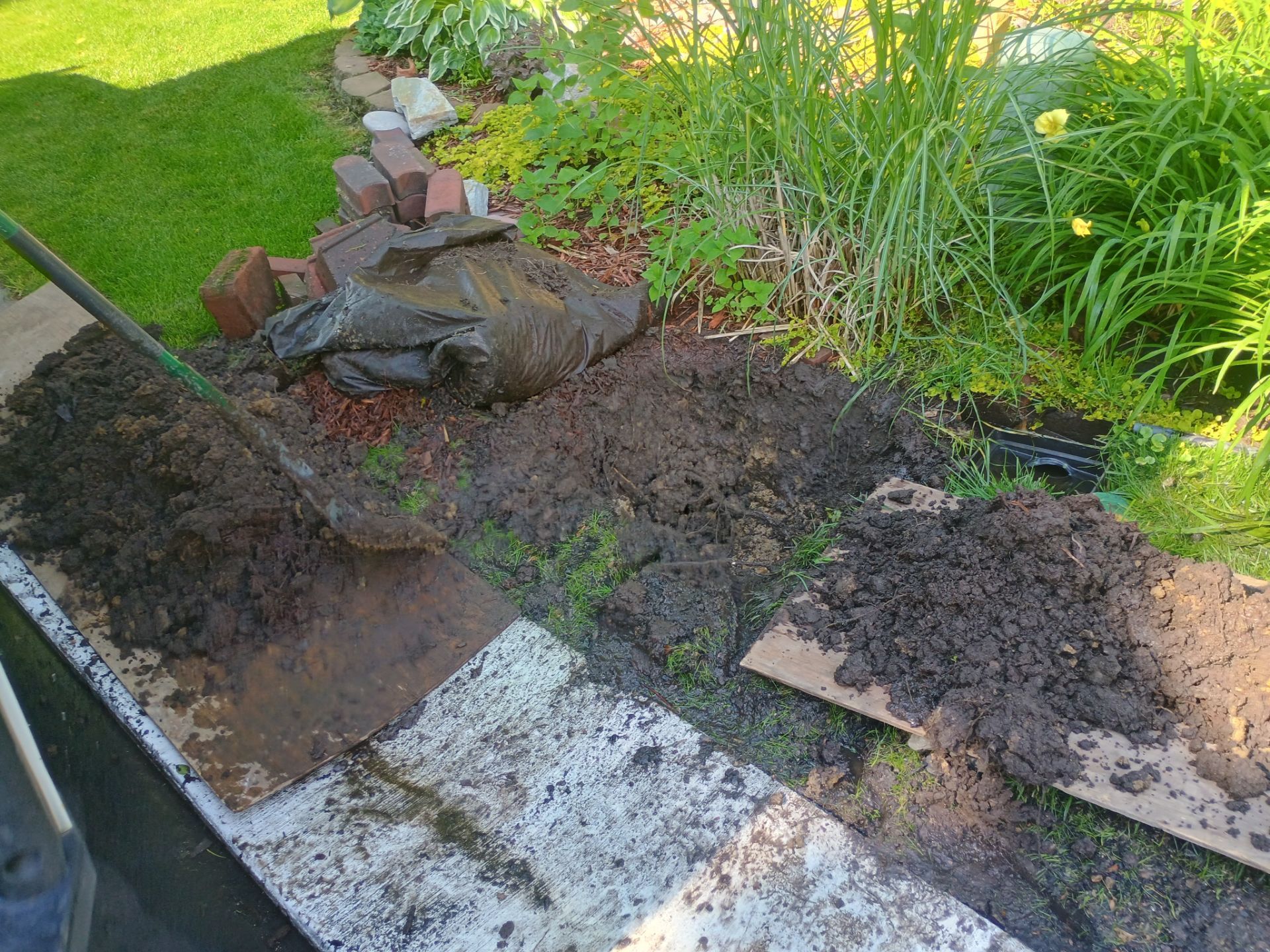 Buried Yard Drainage Installation in Plymouth, MN by Waterproofing Northeast