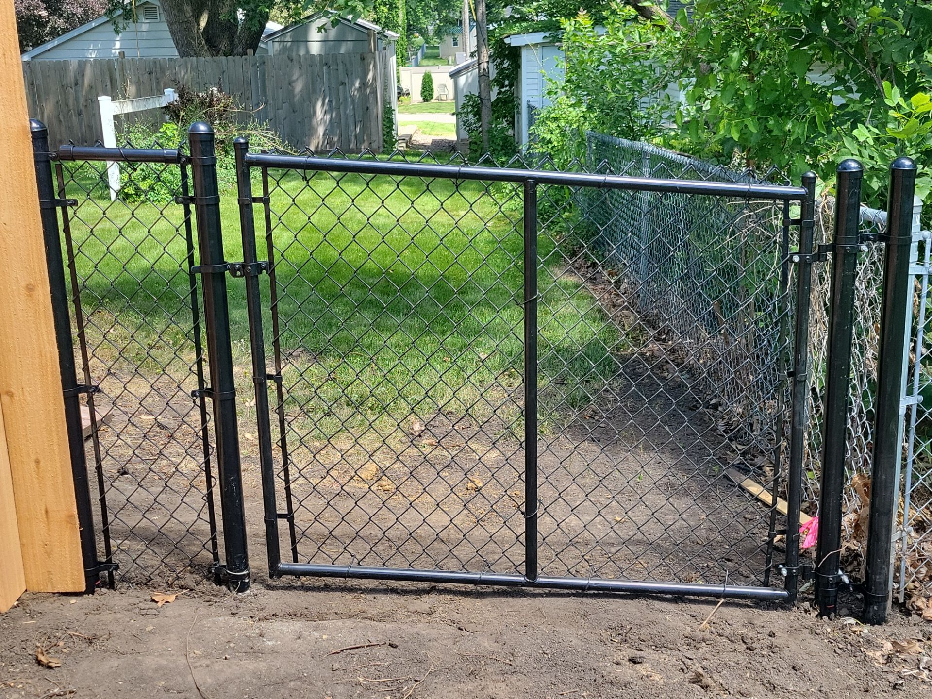 Custom Cedar Unstained Wood Privacy Fence Installation in Cedar Falls by Perfect Picket Fence and Stain