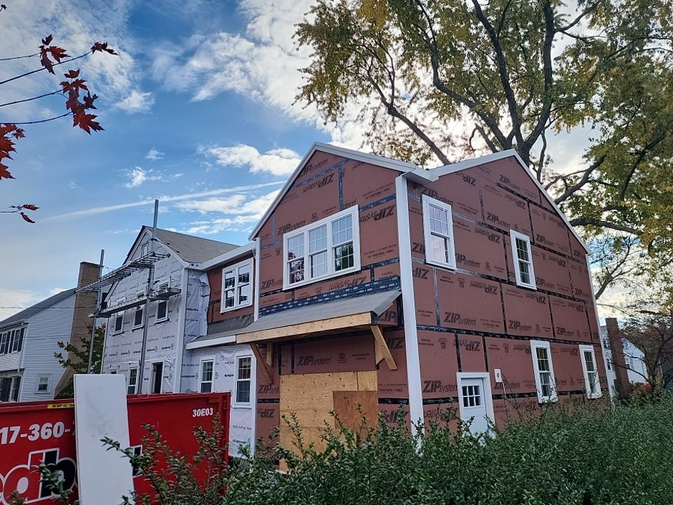 Siding and Roof for house with new addition in Milton, MA by UBrothers Construction