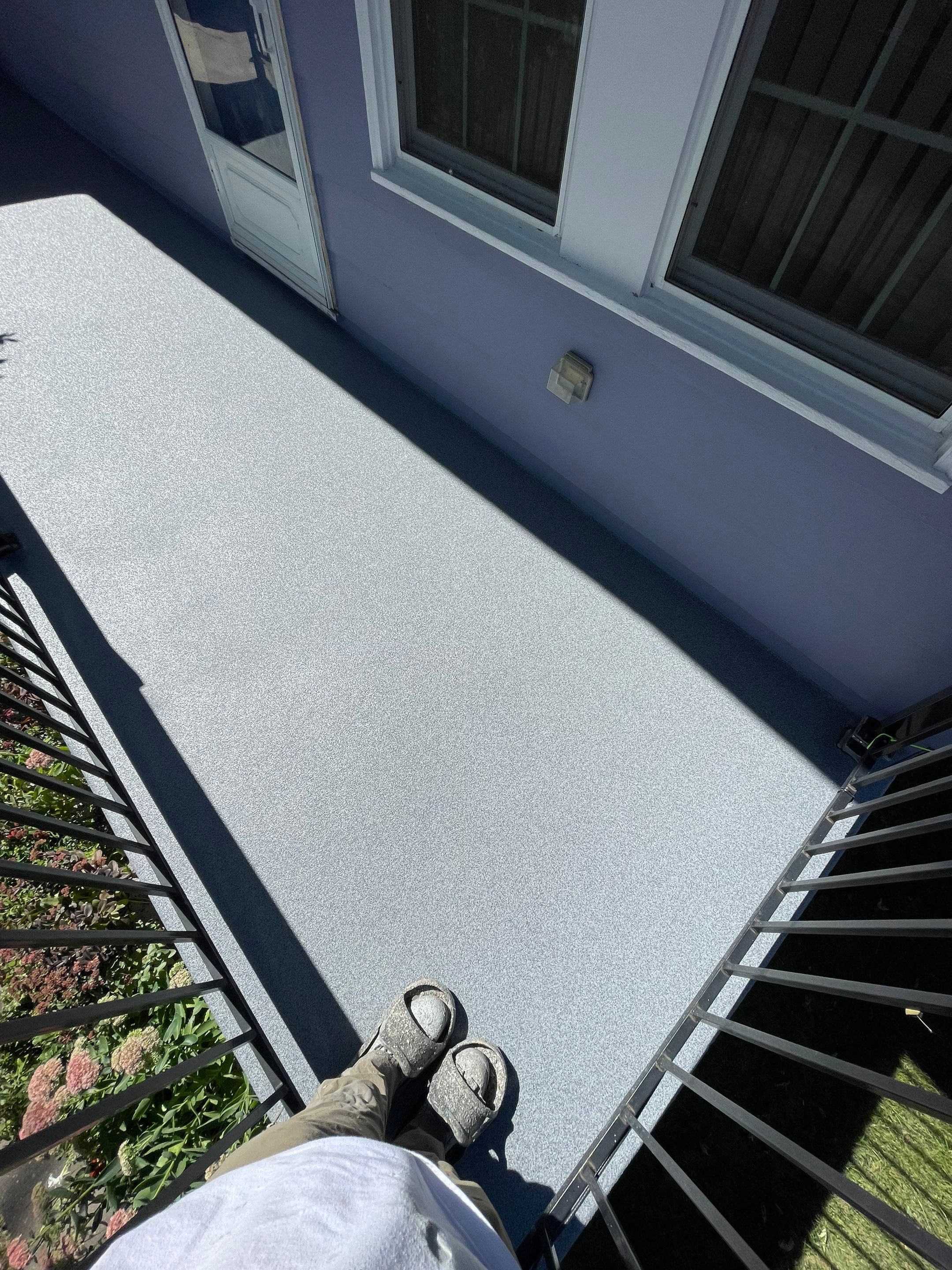 Sioux Falls Concrete Porch Coating with Starry Evening Finish by Select Painting, Coatings & Garage Cabinets