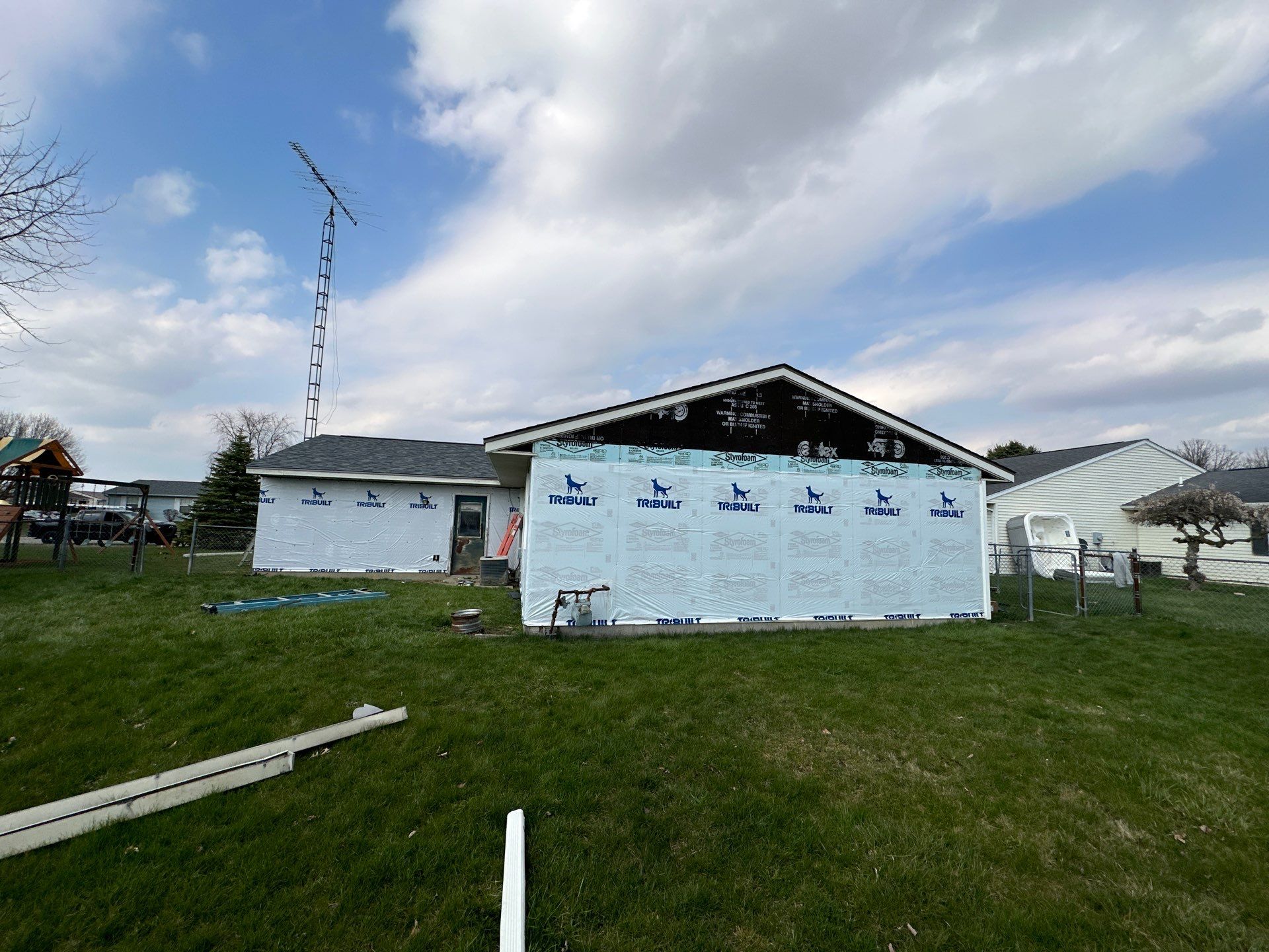 Storm Damage Residential Roof and Siding Installation by WIW Enterprises Inc