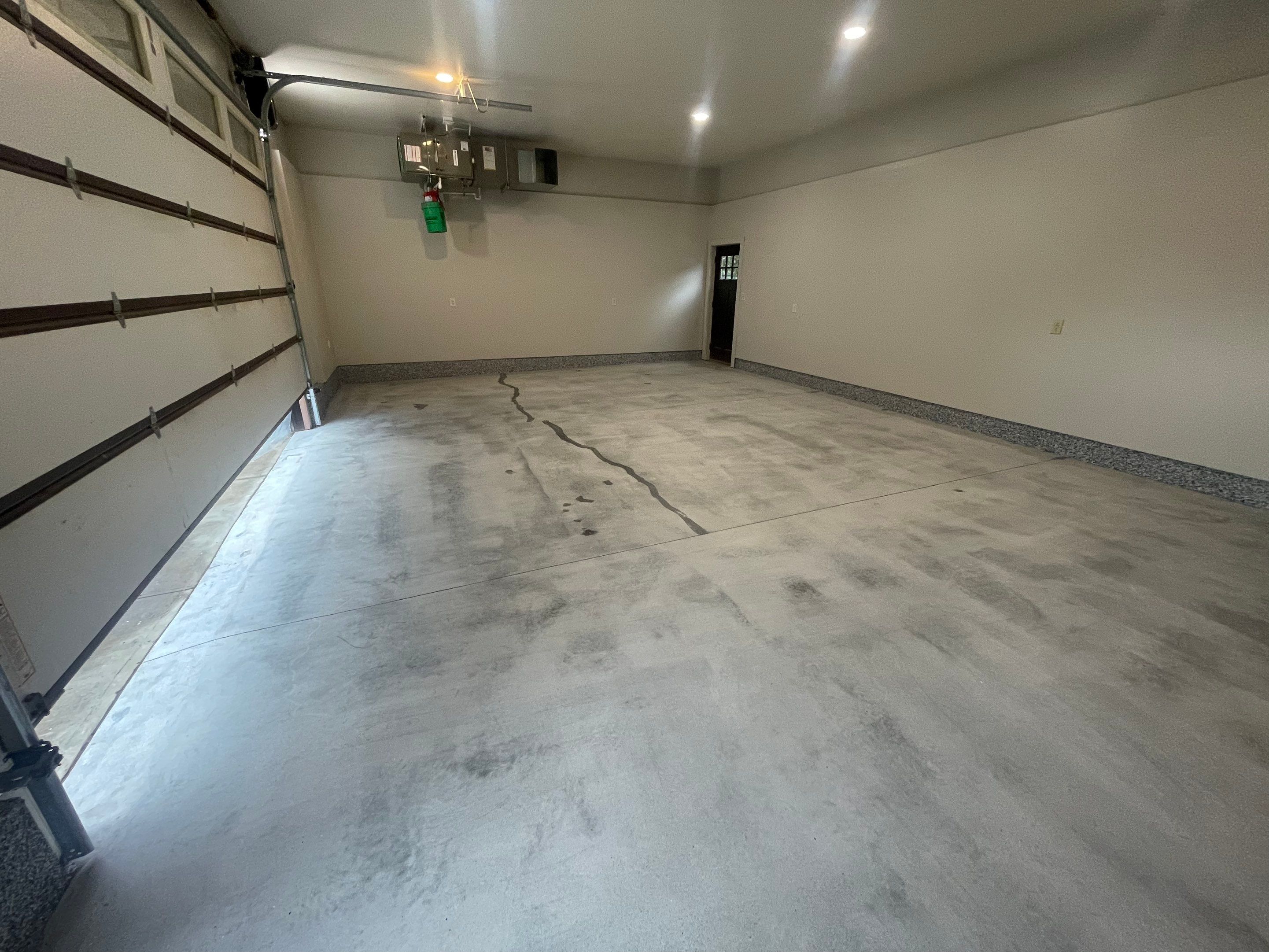 Domino Flake Floor Coating and Crack Repair in Chancellor by Select Painting, Coatings & Garage Cabinets