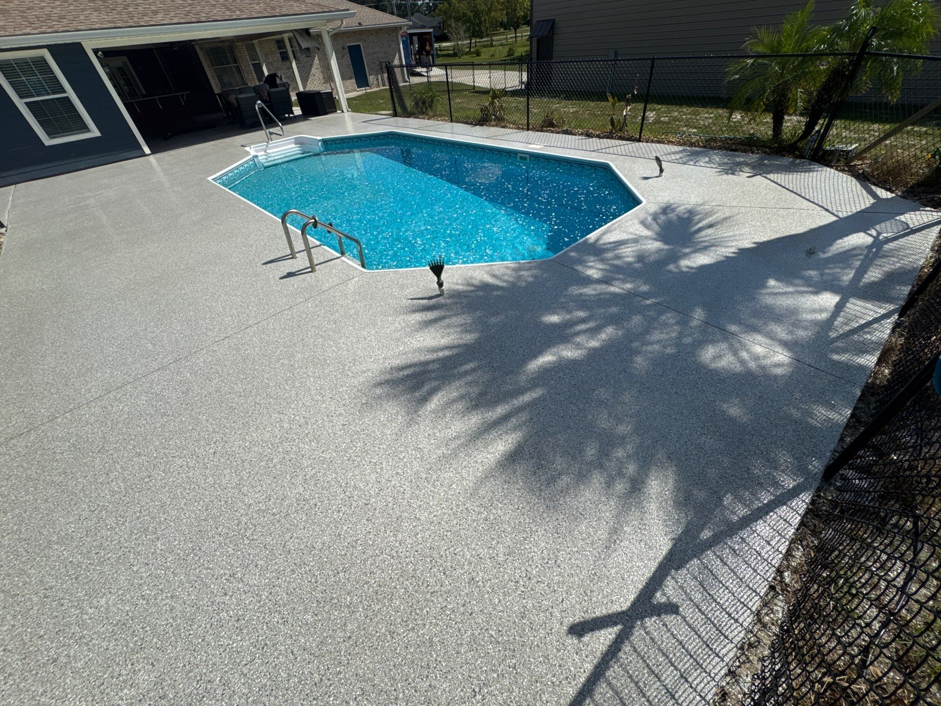 Pool Deck in Lake City, FL in Mount Everest by Cross Creek Concrete Coatings