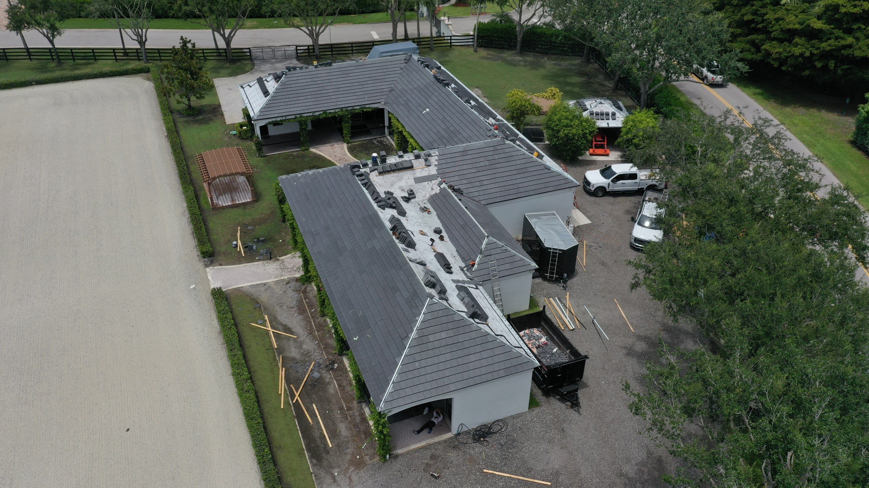 3612 Aiken Ct. Wellington FL - Westlake Newpoint Saxony 900 Slate - Charcoal Grey by Total Roofing System The Metal Roof Experts
