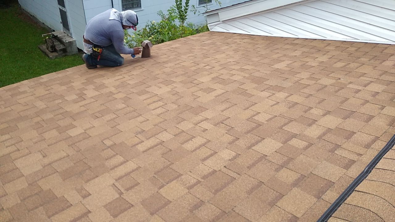 Residential Roofing Installation using Roof Replacement by American Roofing & Construction LLC