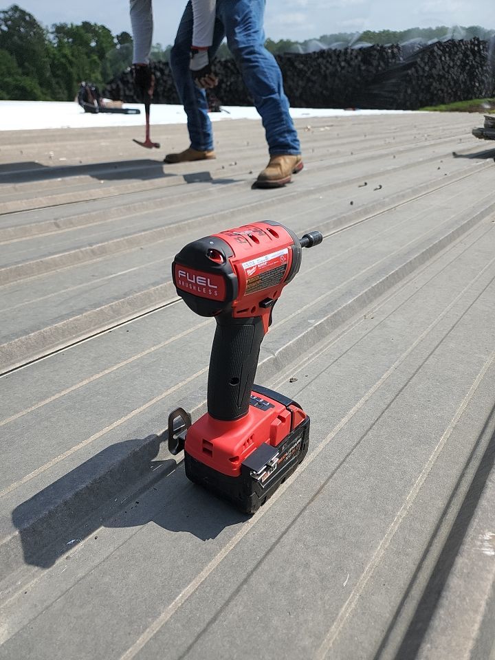 Commercial Roofing Installation using Aluminum Roofing panels by Hostetler Roofing