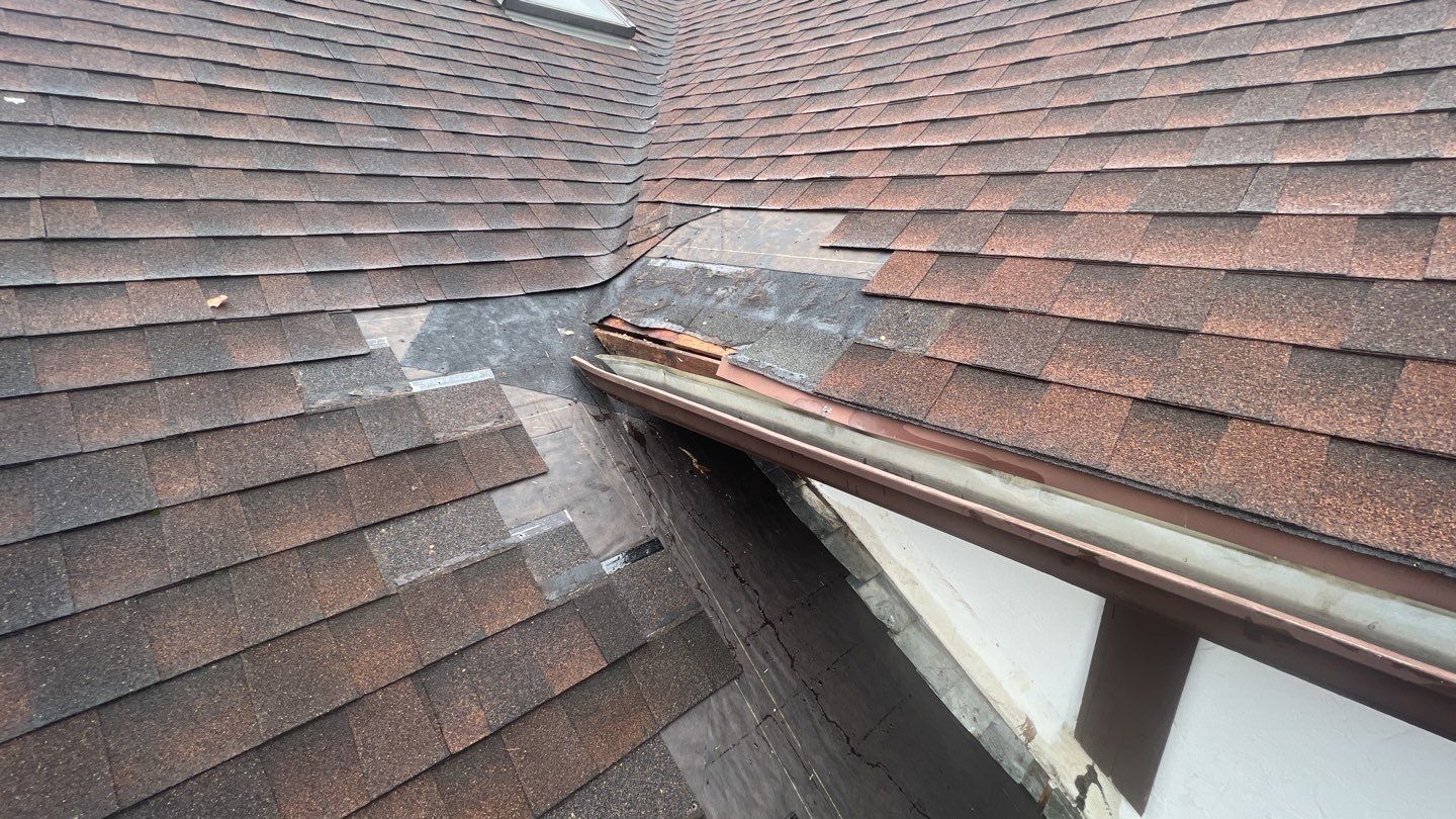 Step flashing repair on roof to wall by Pro Home Services Inc