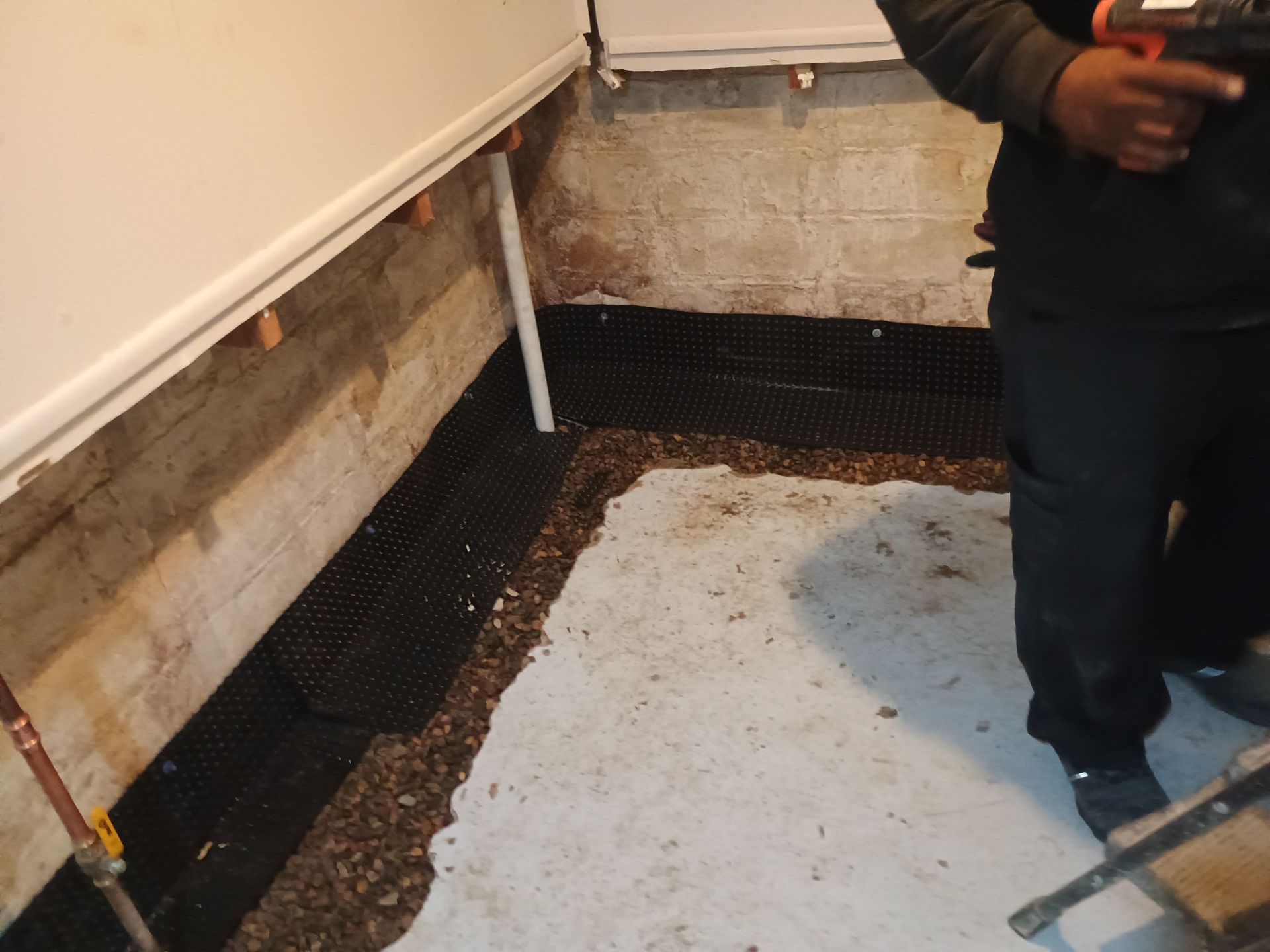 Interior Drain Tile & Sump Pump Installation in St. Paul, MN by Waterproofing Northeast