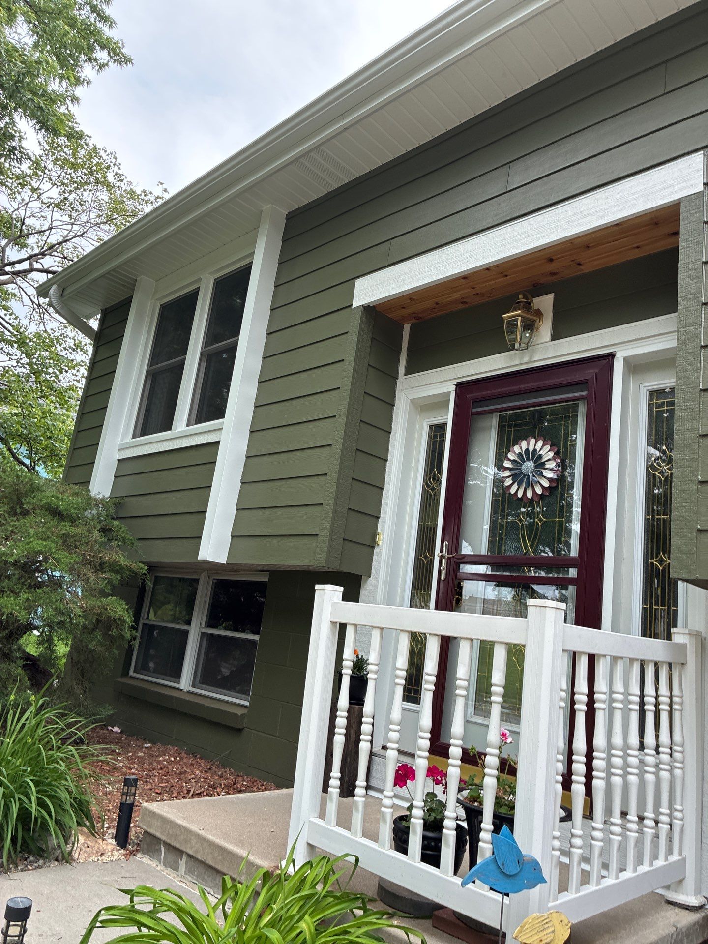James Hardie Siding Replacement in Omaha with Mountain Sage Finish by Carps Complete Exteriors