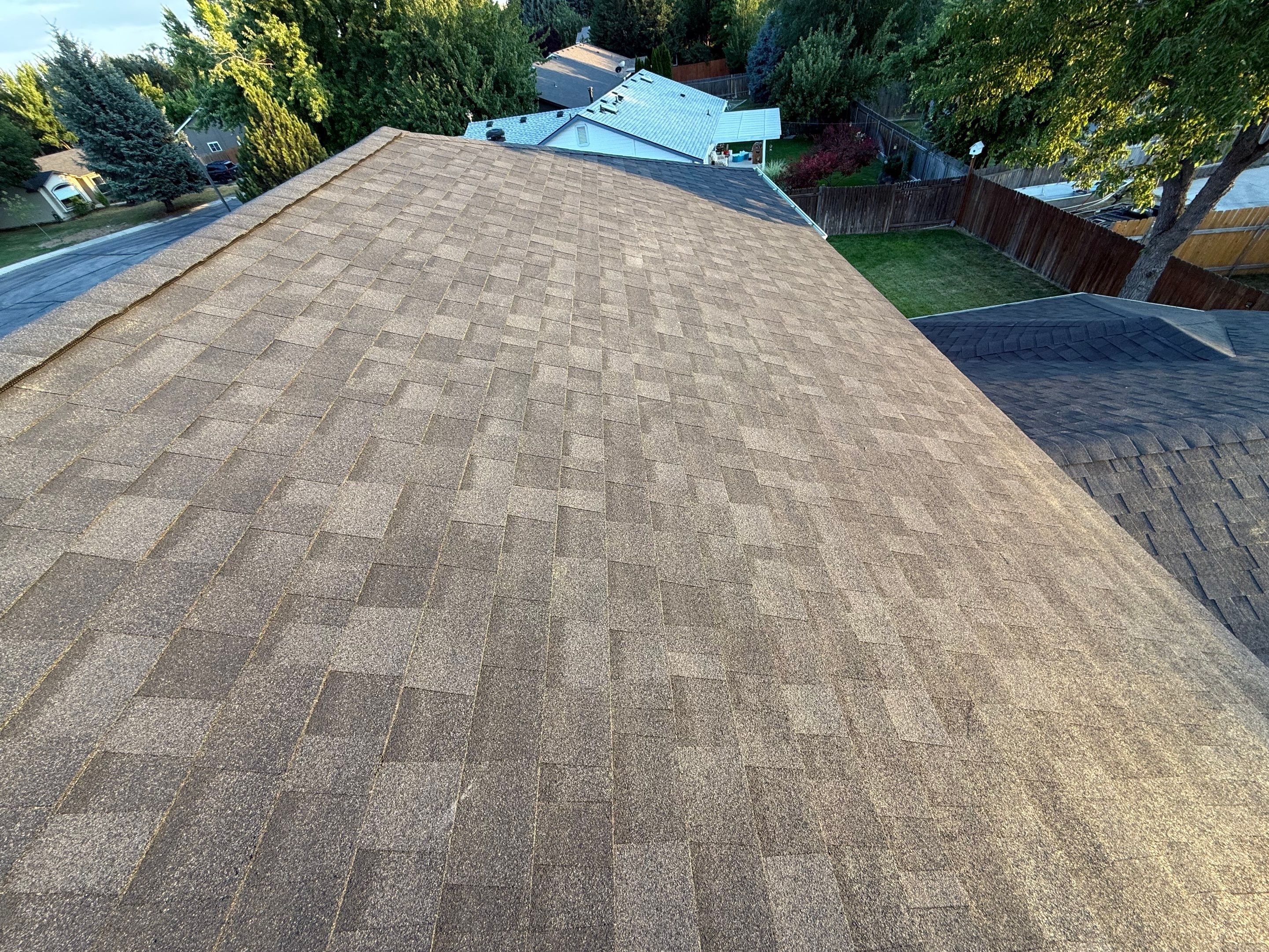 Residential Roof Replacement and Seamless Gutter Installation in Boise by Olive Roofing