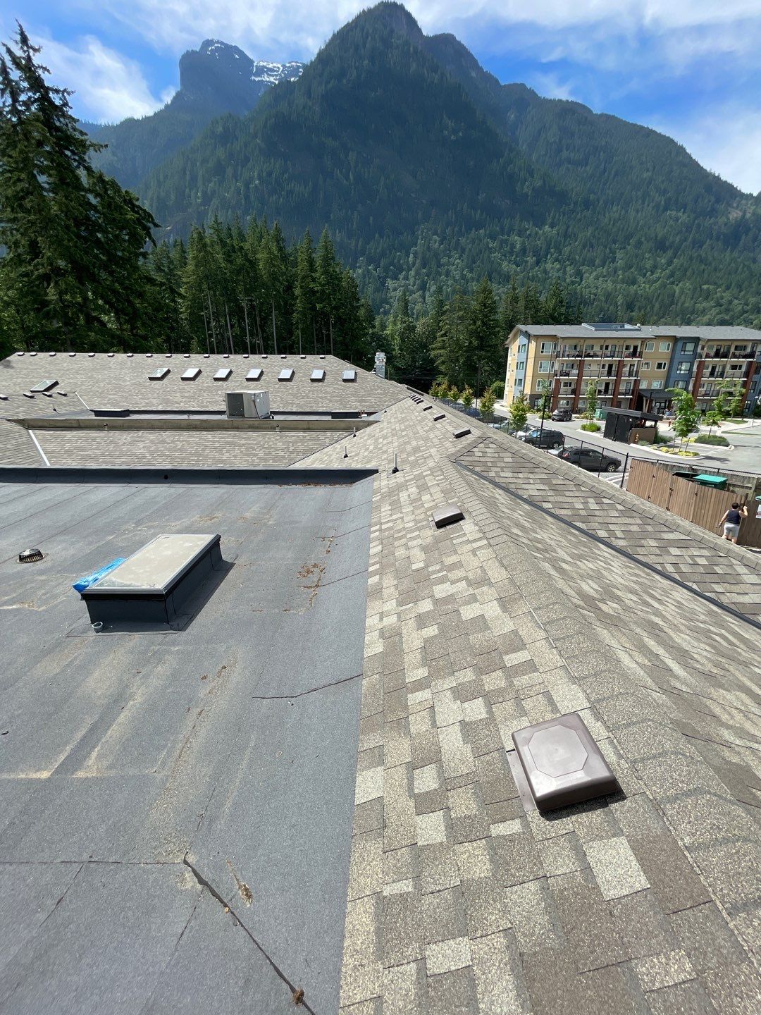 Residential ReRoofing Installation using OC Oakridge shingles by Top Notch Roofing Inc