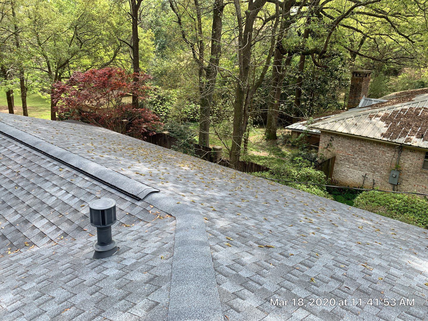 Residential Roofing Installation using Roof Replacement by American Roofing & Construction LLC
