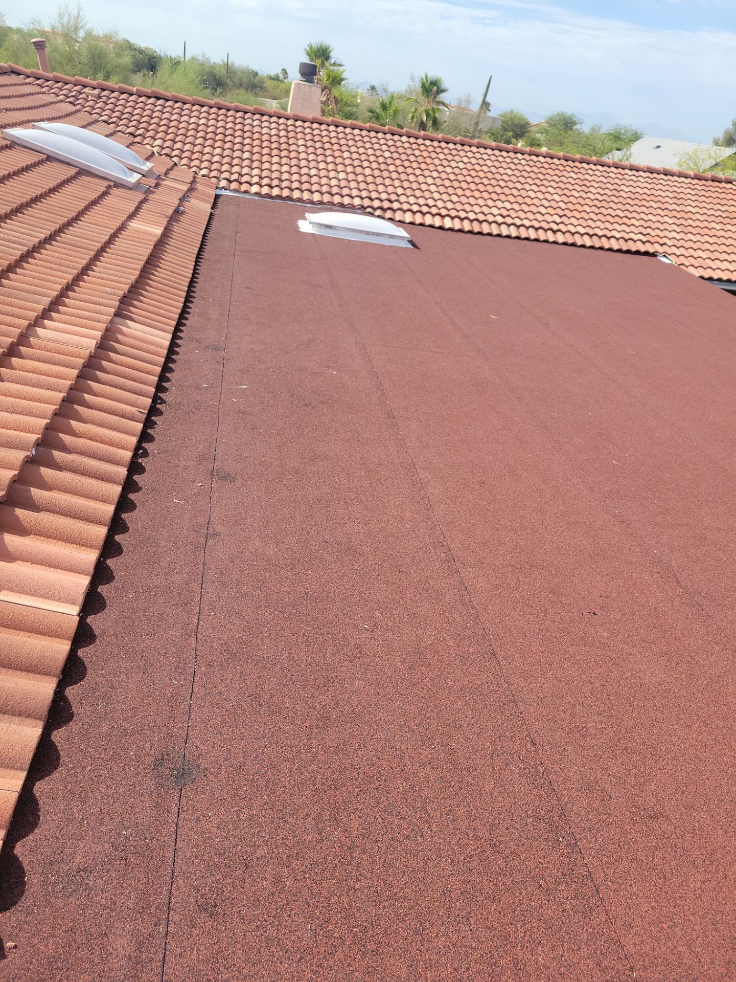 Residential Tile Roof Restoration and Low Slope Membrane Replacement in Tucson by West Coast Roofing AZ