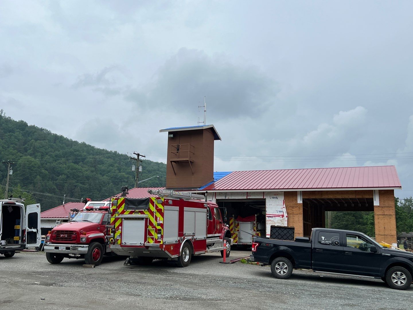 Commercial Roofing Installation using 12" Prolok metal  by Top Notch Roofing Inc