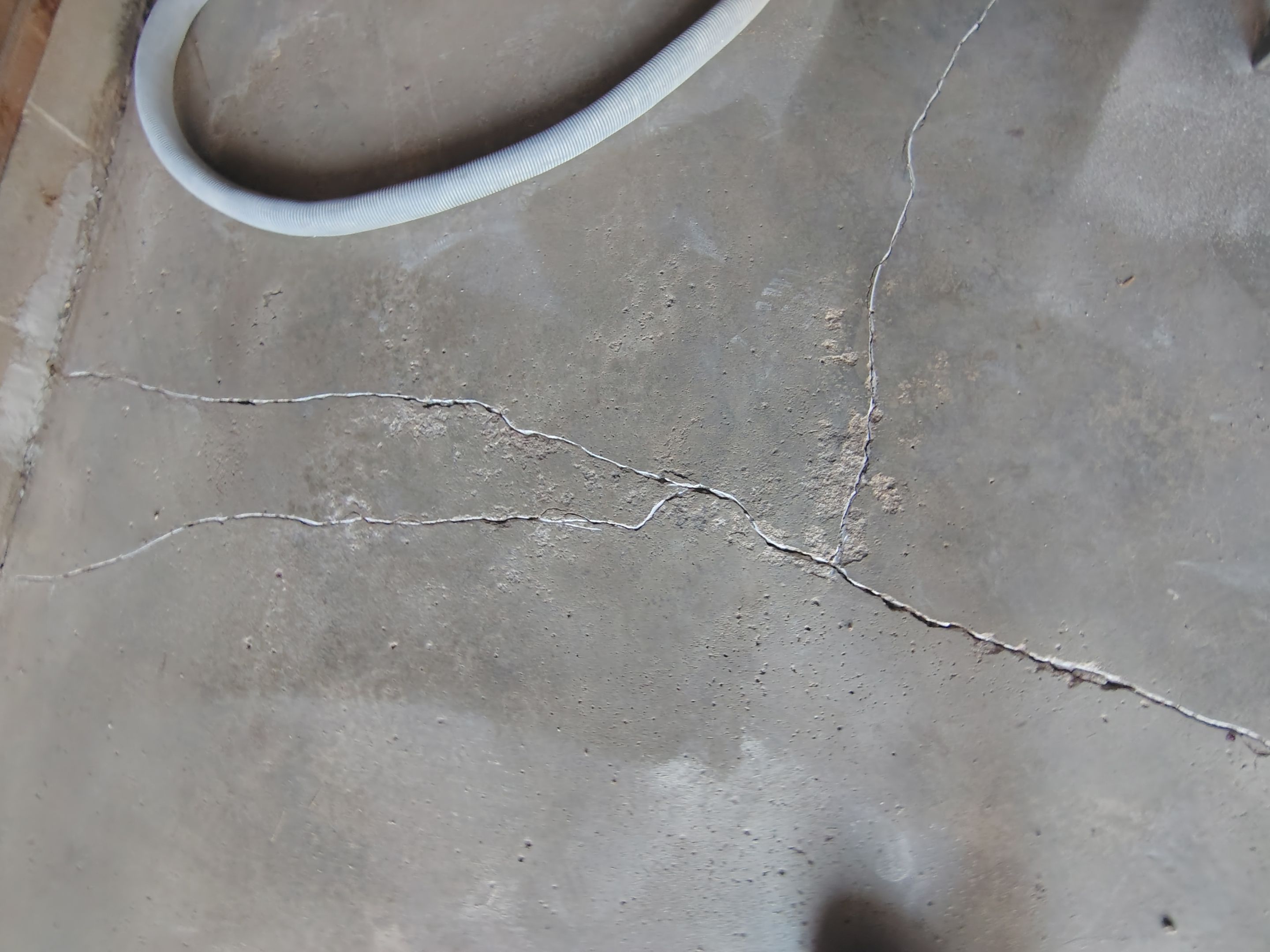 Sioux Falls Garage Epoxy Floor Installation and Concrete Crack Repair by Select Painting, Coatings & Garage Cabinets