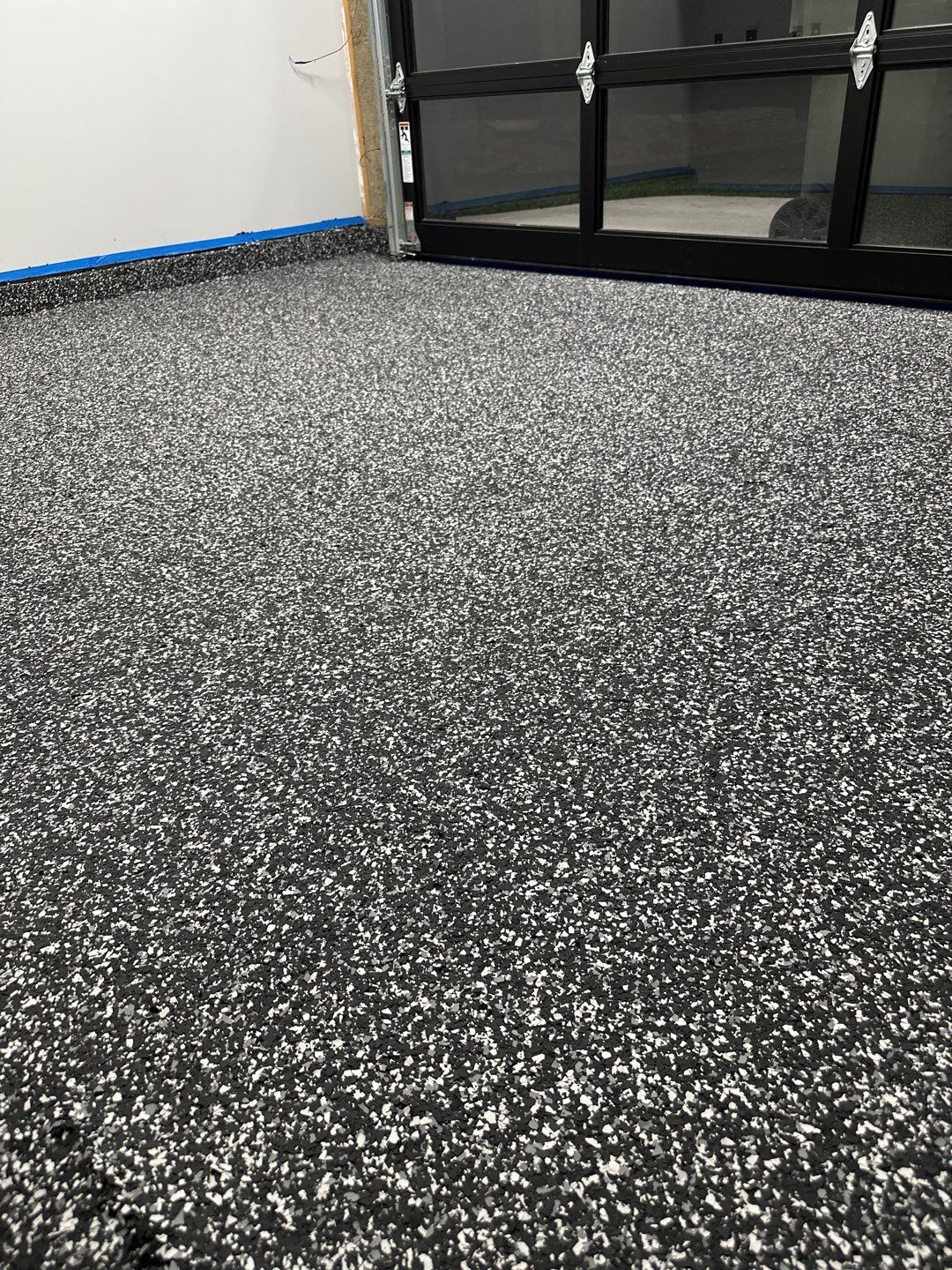 Custom Flake Epoxy Garage Floor in Lincoln by Goat Coatings