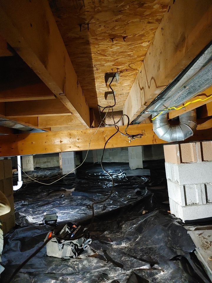 Crawl space encapsulation and Waterproofing using Structural Wood and Steel Reinforcements by Toledo Basement Repair 