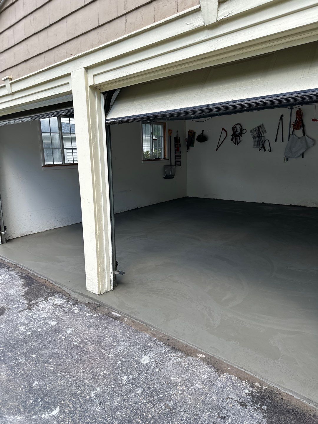 Concrete garage floor replacement   by NG Masonry & Construction LLC