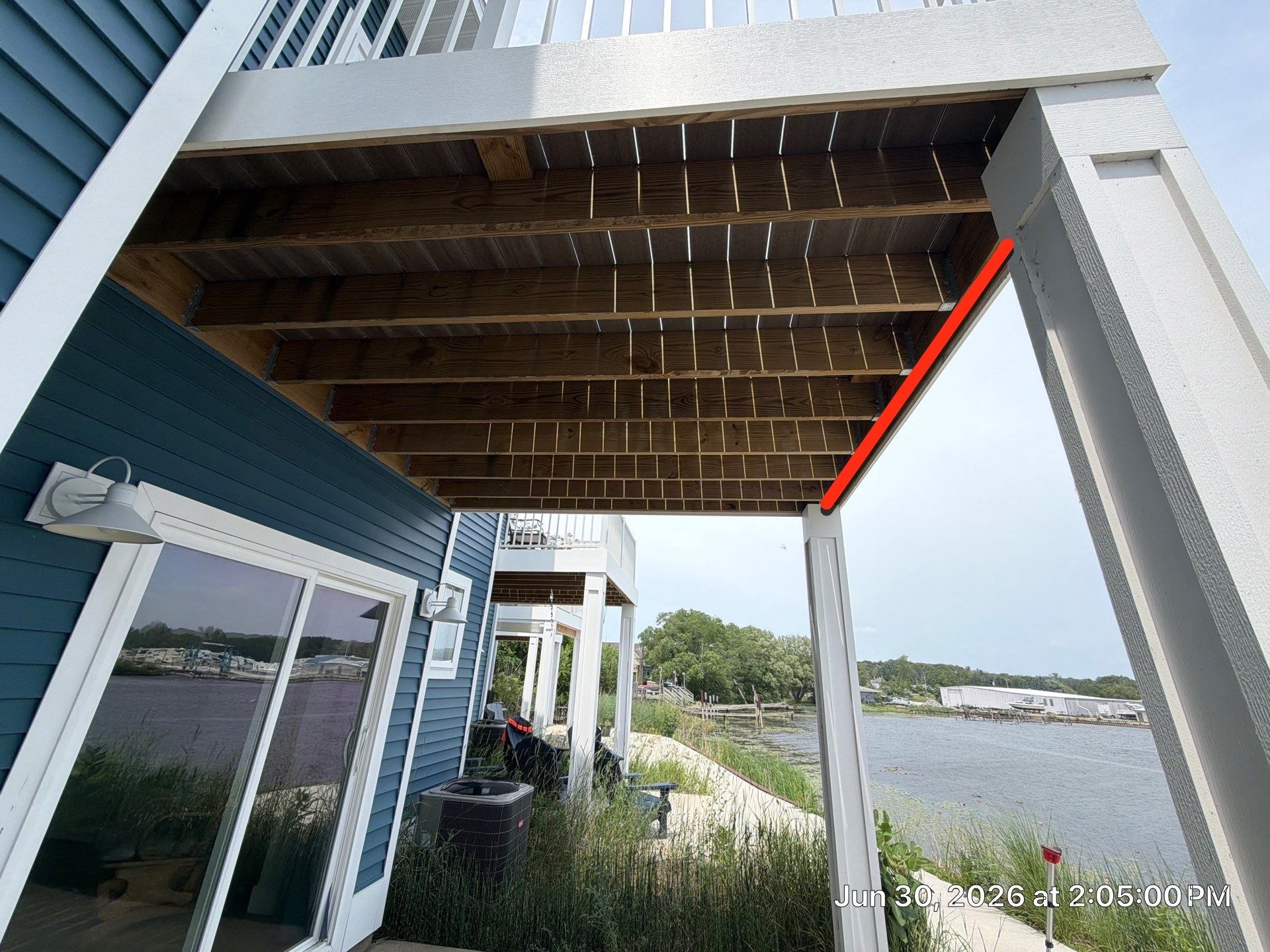 Underdecking Installation for Waterfront Townhouse in Manistee by Rainbow Seamless Systems