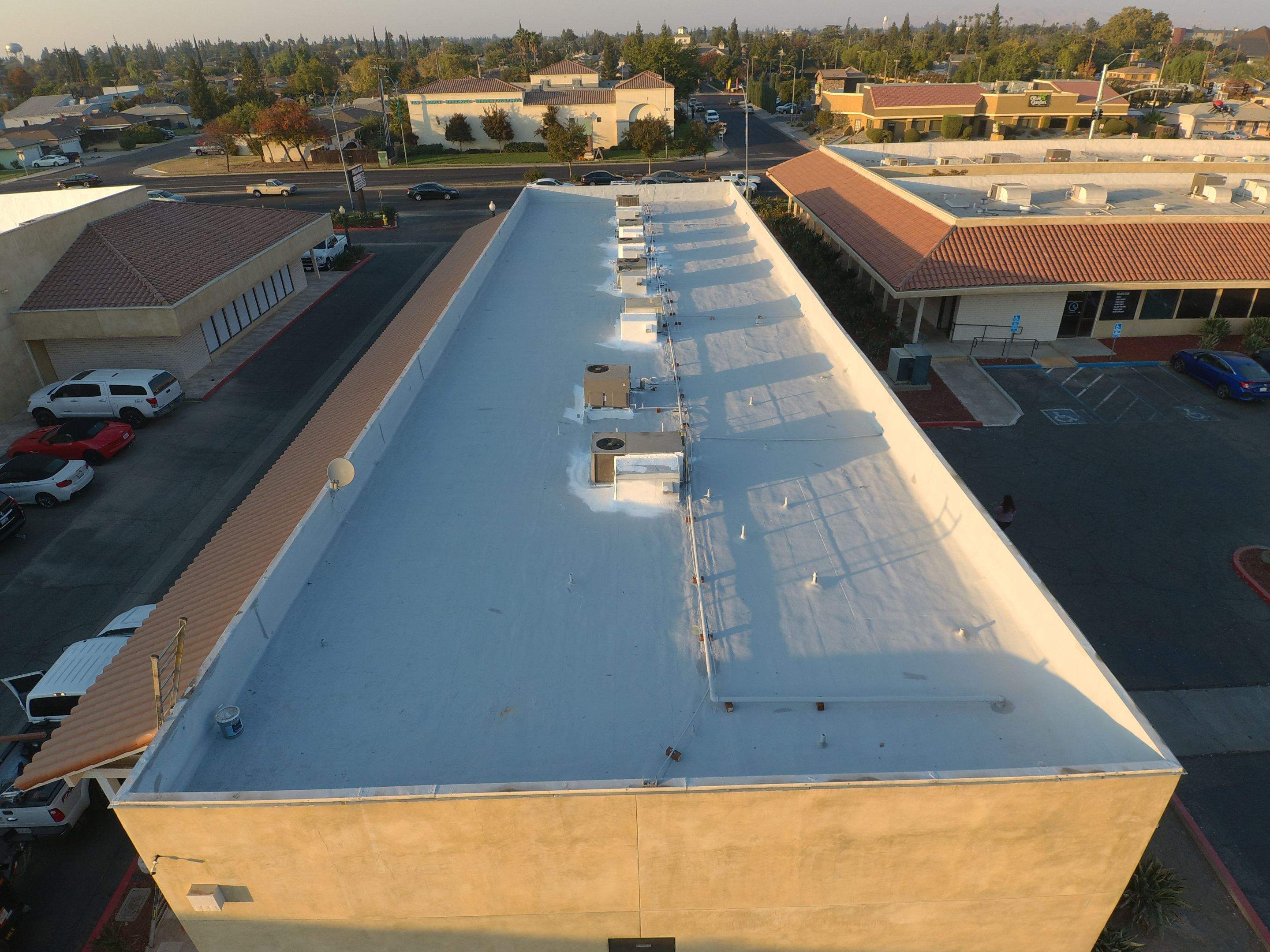 Reburbish existing spray foam job by Straight Edge Roofing Inc