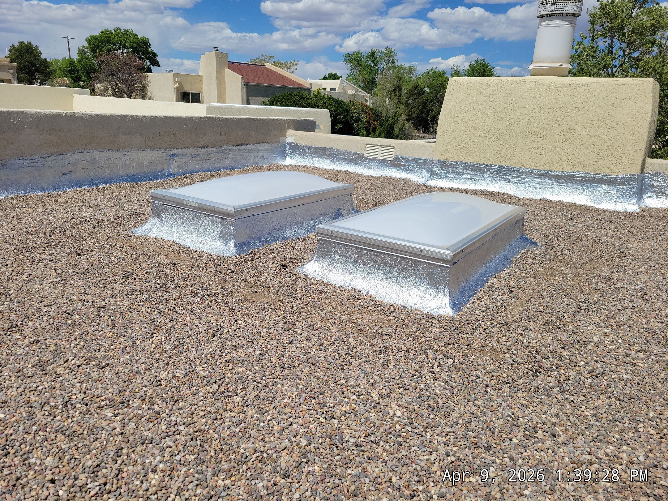 Tar and Gravel Roof Maintenance and Skylight Sealing in Rio Rancho by Doyle Roof Masters Inc
