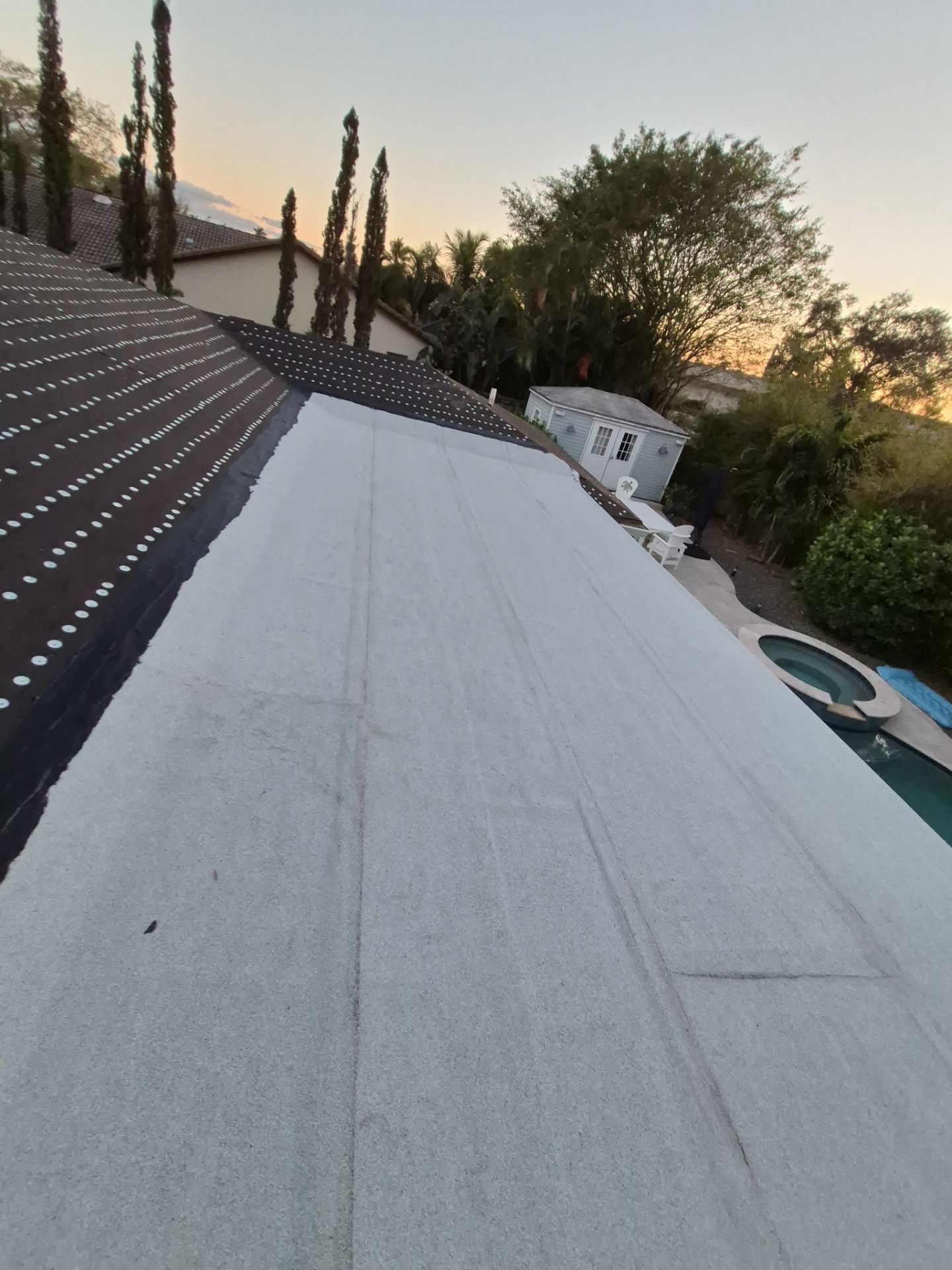 Residential Roofing Installation using 1" Nail strip metal roof by BLUES BROTHERS CONSTRUCTION CORP