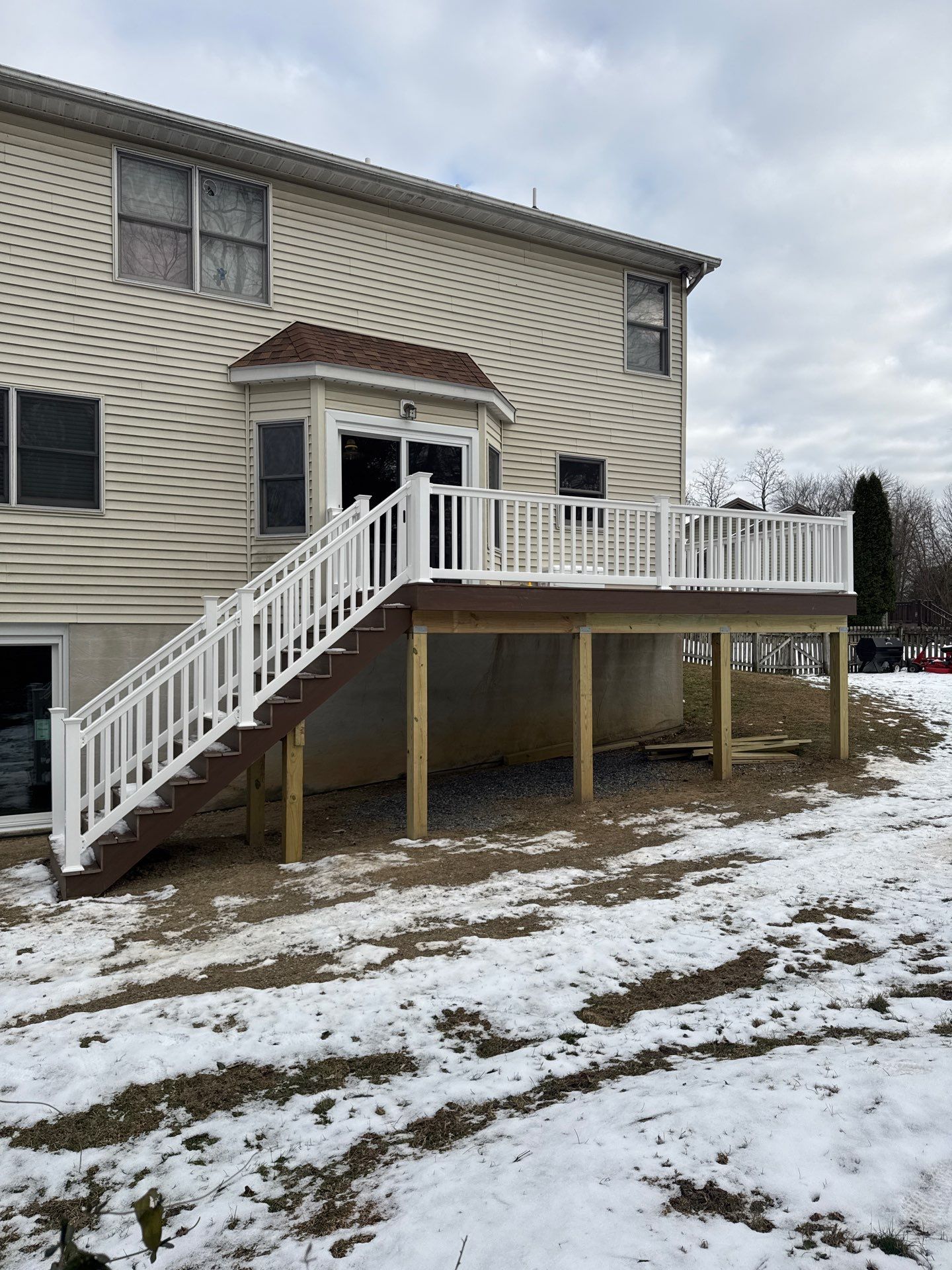 Patio door replacement and deck upgrade by Esh Builders