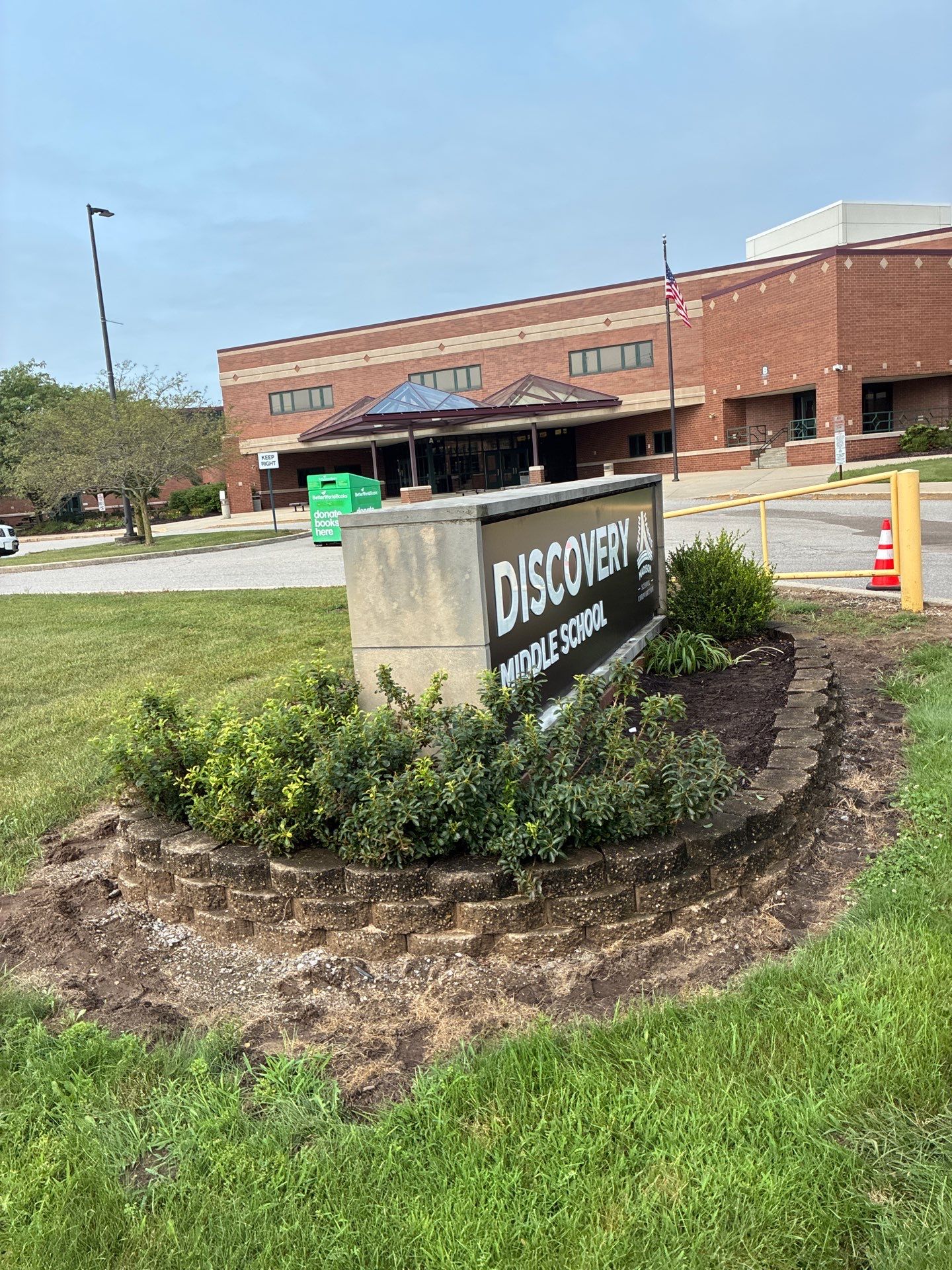 New Monument Sign and Stone Retaining Wall in Granger by Hayes Design co