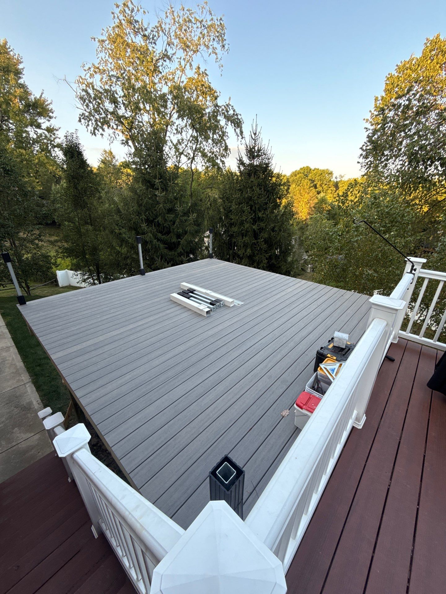 Deck extension  by Cousins Roofing Siding & Decks