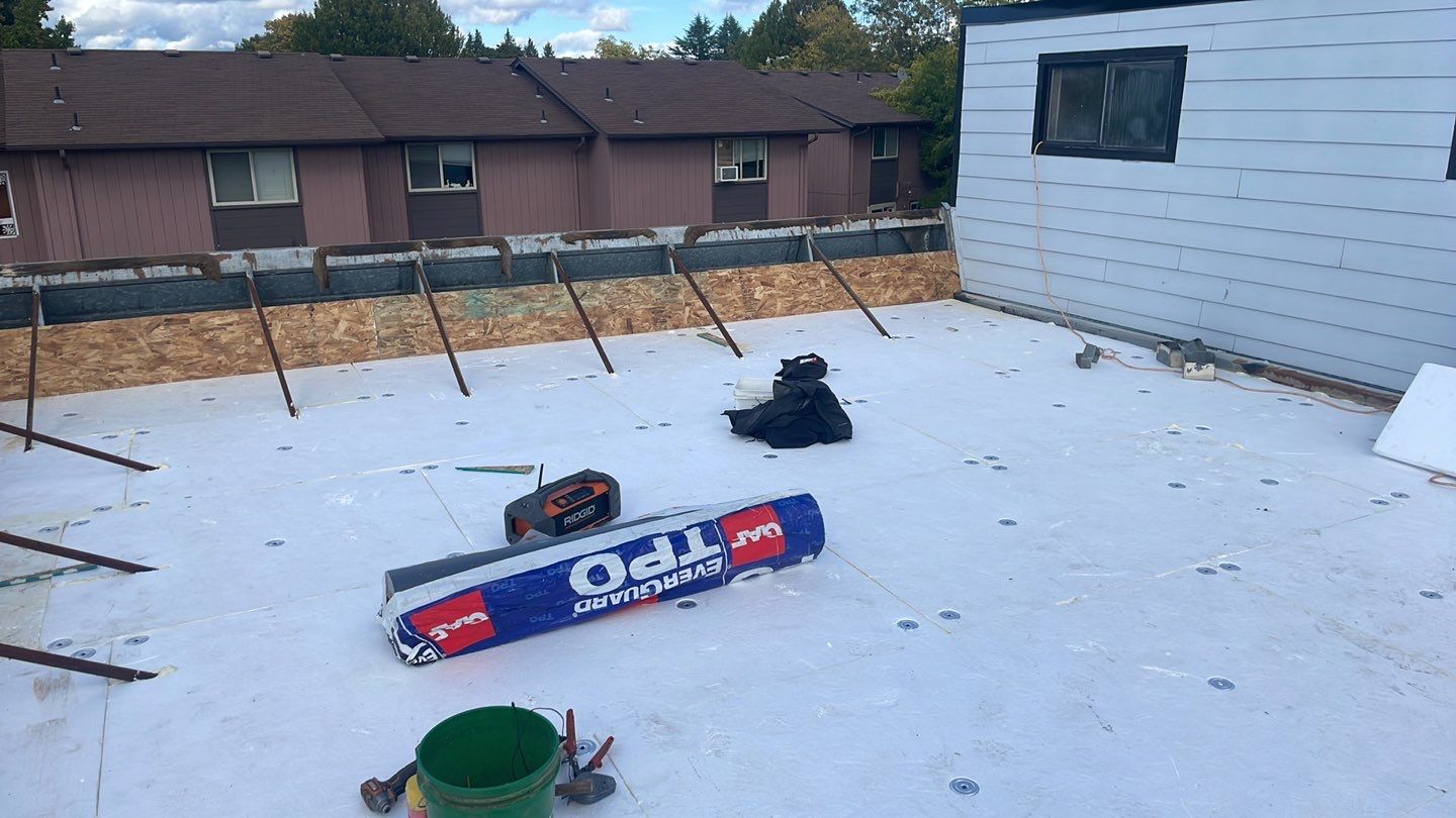 Commercial Roofing Installation using GAF 60Mil TPO  by Orezona Building & Roofing Company, Inc.