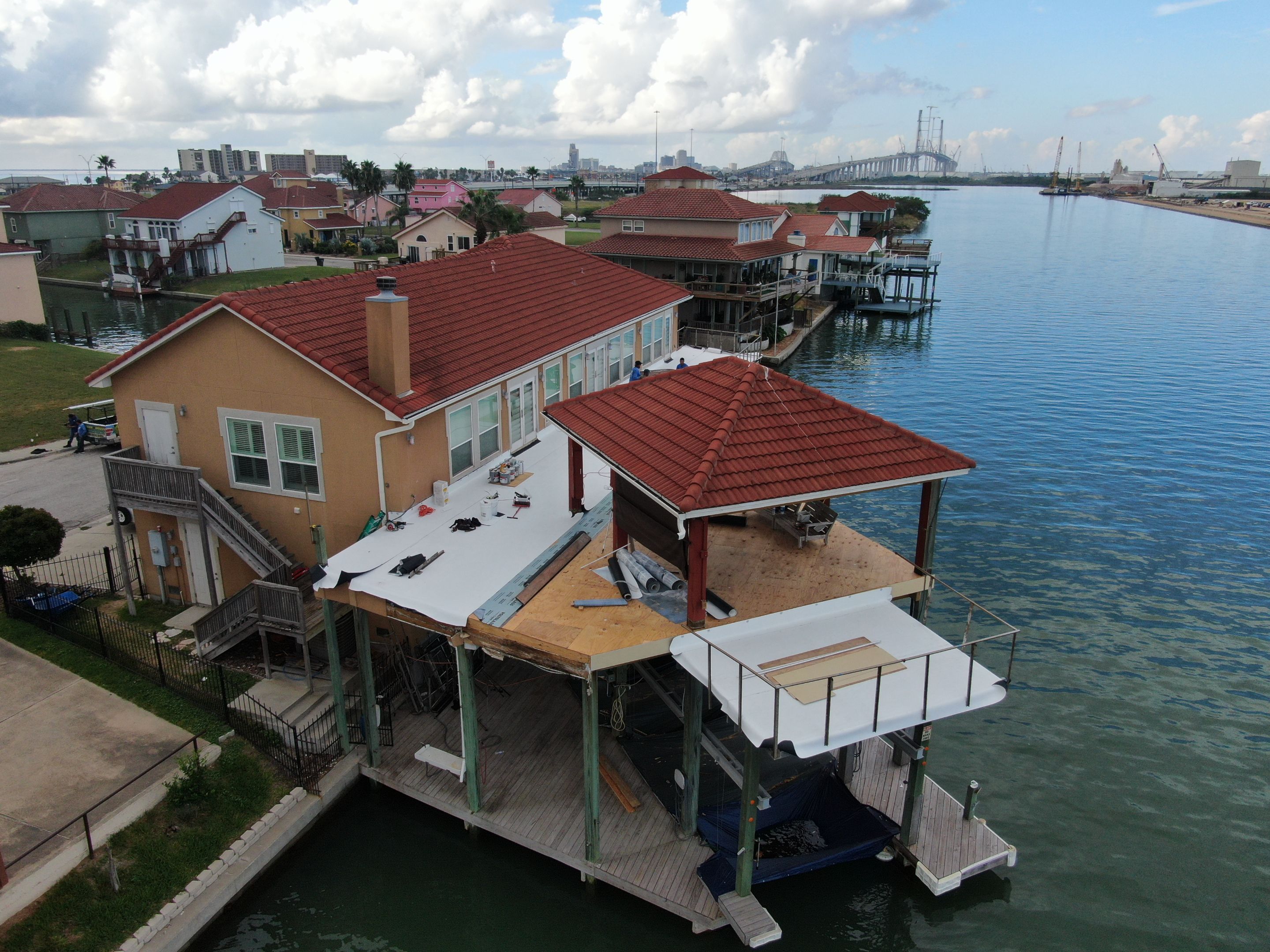 Walk Out Patio Cover by Bayfront Roofing and Construction