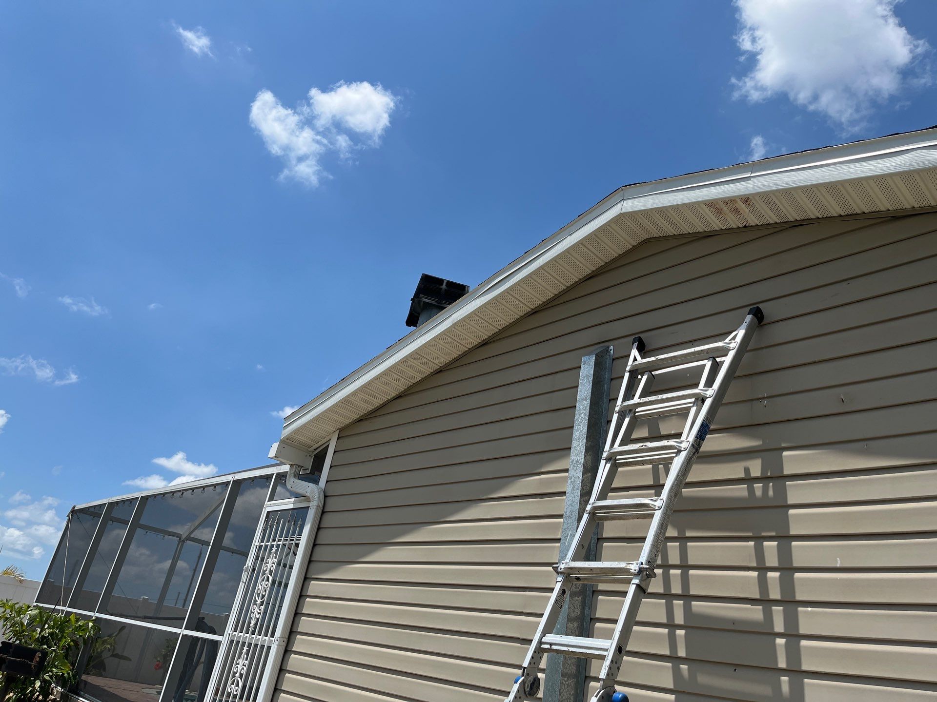 Replace gutter using Leaf Guard in Cape Coral FL by Gutter Professors