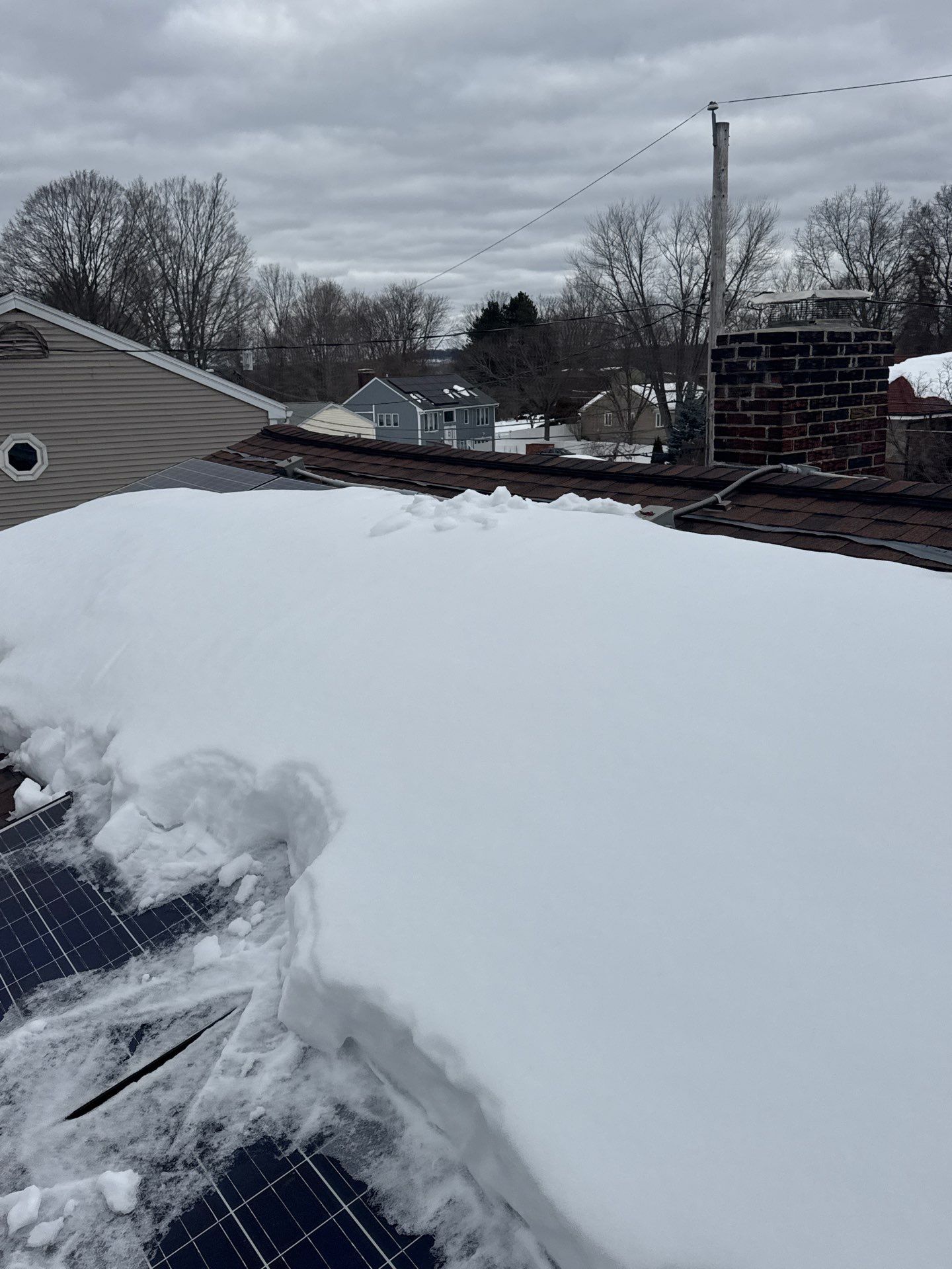 Ice Dam Removal & Snow Removal in Woburn, MA by Mighty Dog Roofing of Greater Middlesex County