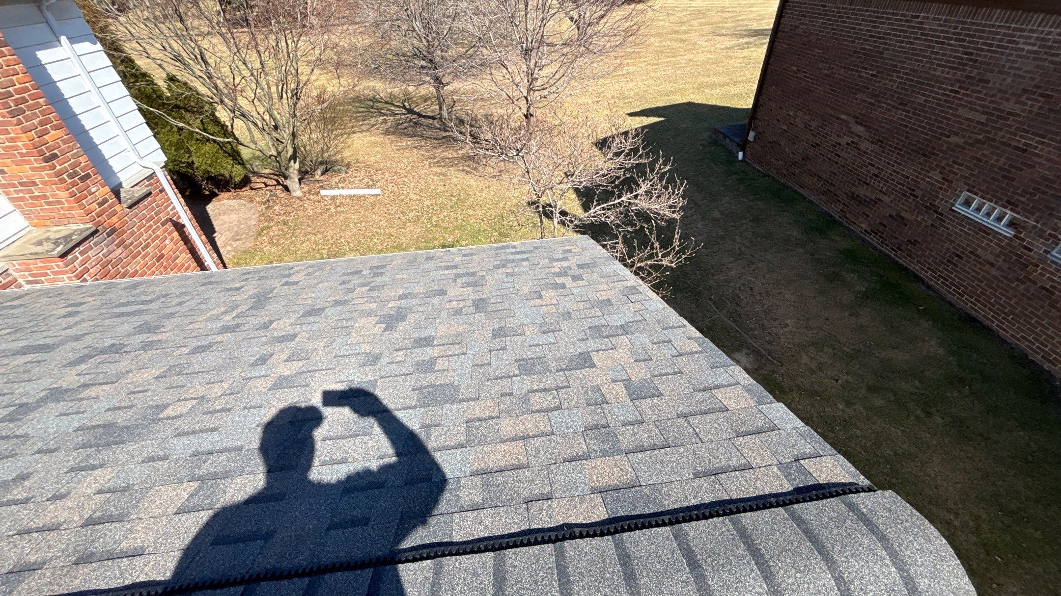 Siding Replacement using Alside Charcoal Smoke and Roof Replacement using Owens Corning Peppercorn by 180 Contractors