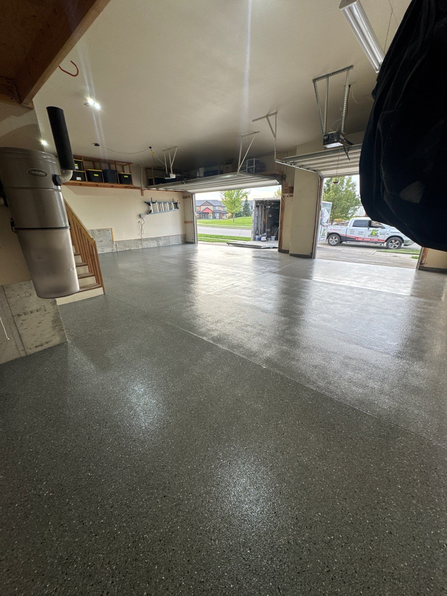 Custom Gray Speckled Polyaspartic Garage Floor Coating in Cheney by Croc Coatings, LLC
