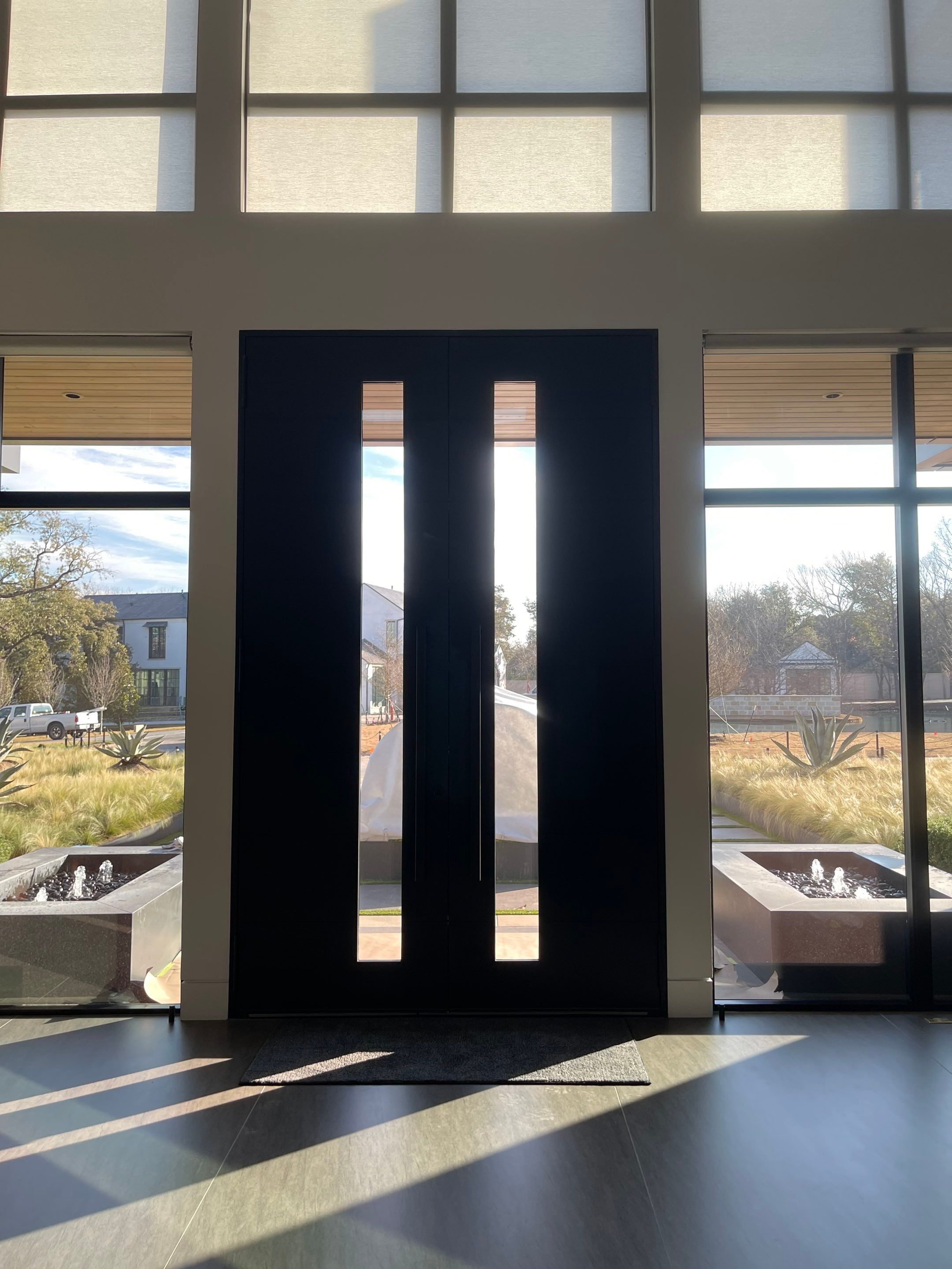 Modern Entry Door Installation and Custom Finishing in Dallas by Solara Custom Living