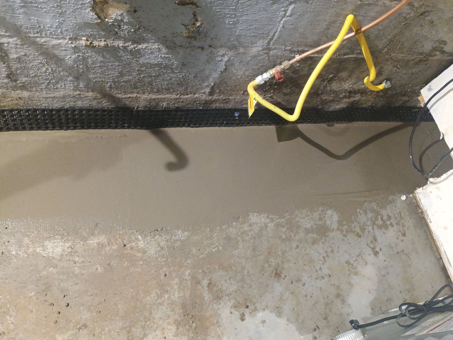 Basement Waterproofing (Drain tile & Sump pump) in North Minneapolis by Waterproofing Northeast