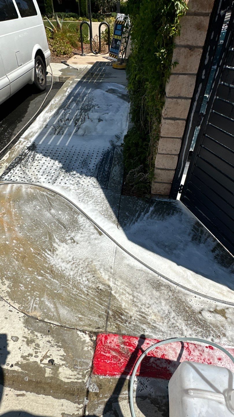 Degreasing a Trash Enclosure to Keep the Flies Away by Property Cleaning Experts, LLC