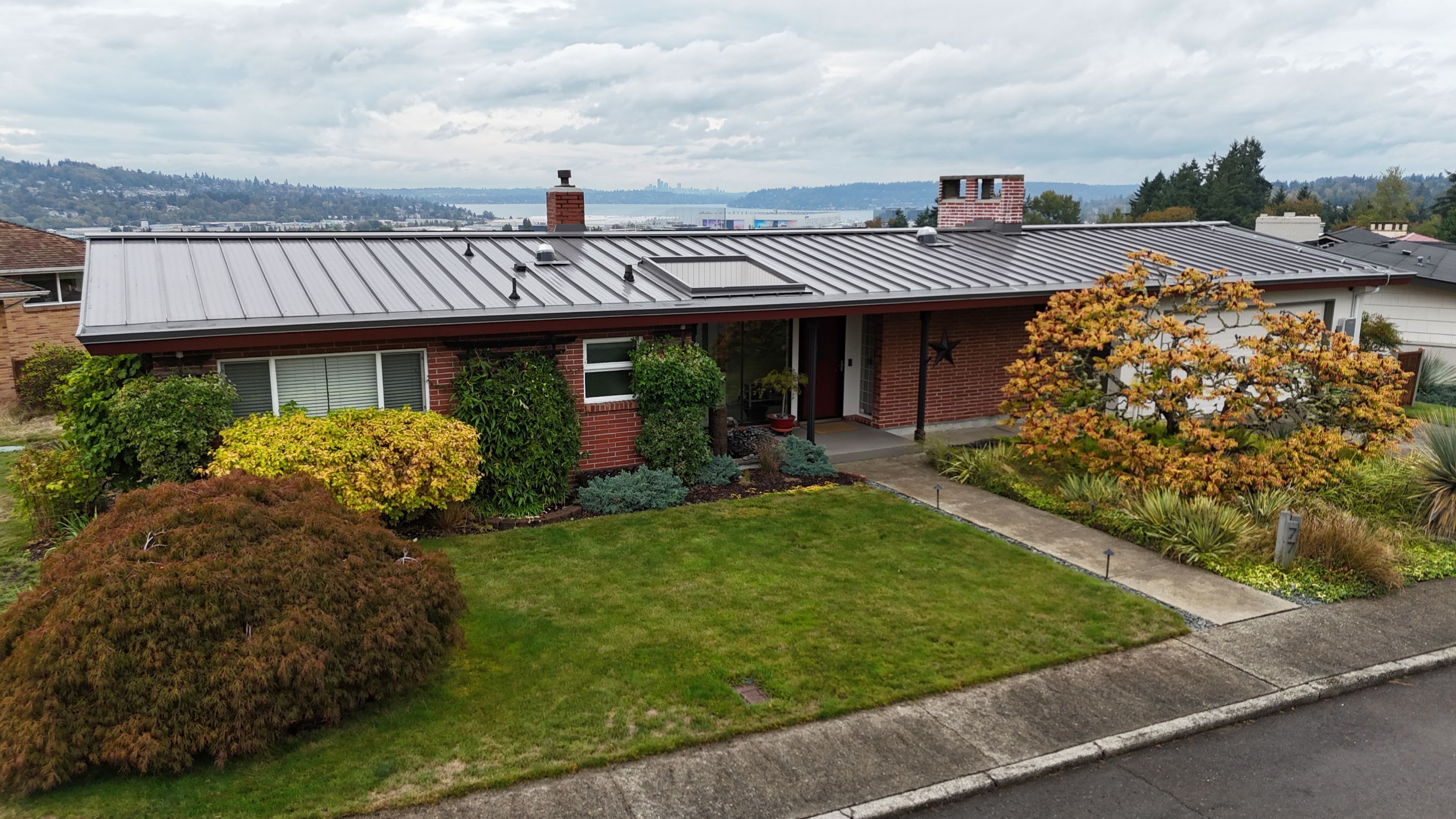 Low Slope Shingles to Metal with Built in Gutters by Roof Smart