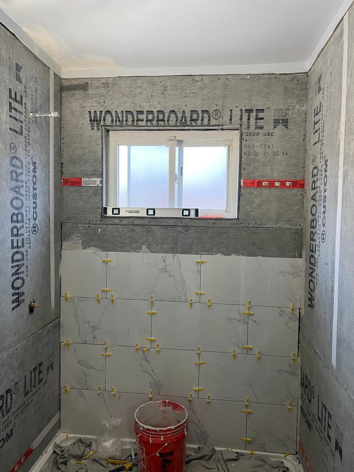 Bathroom Remodel using Tile by Home Concepts Construction