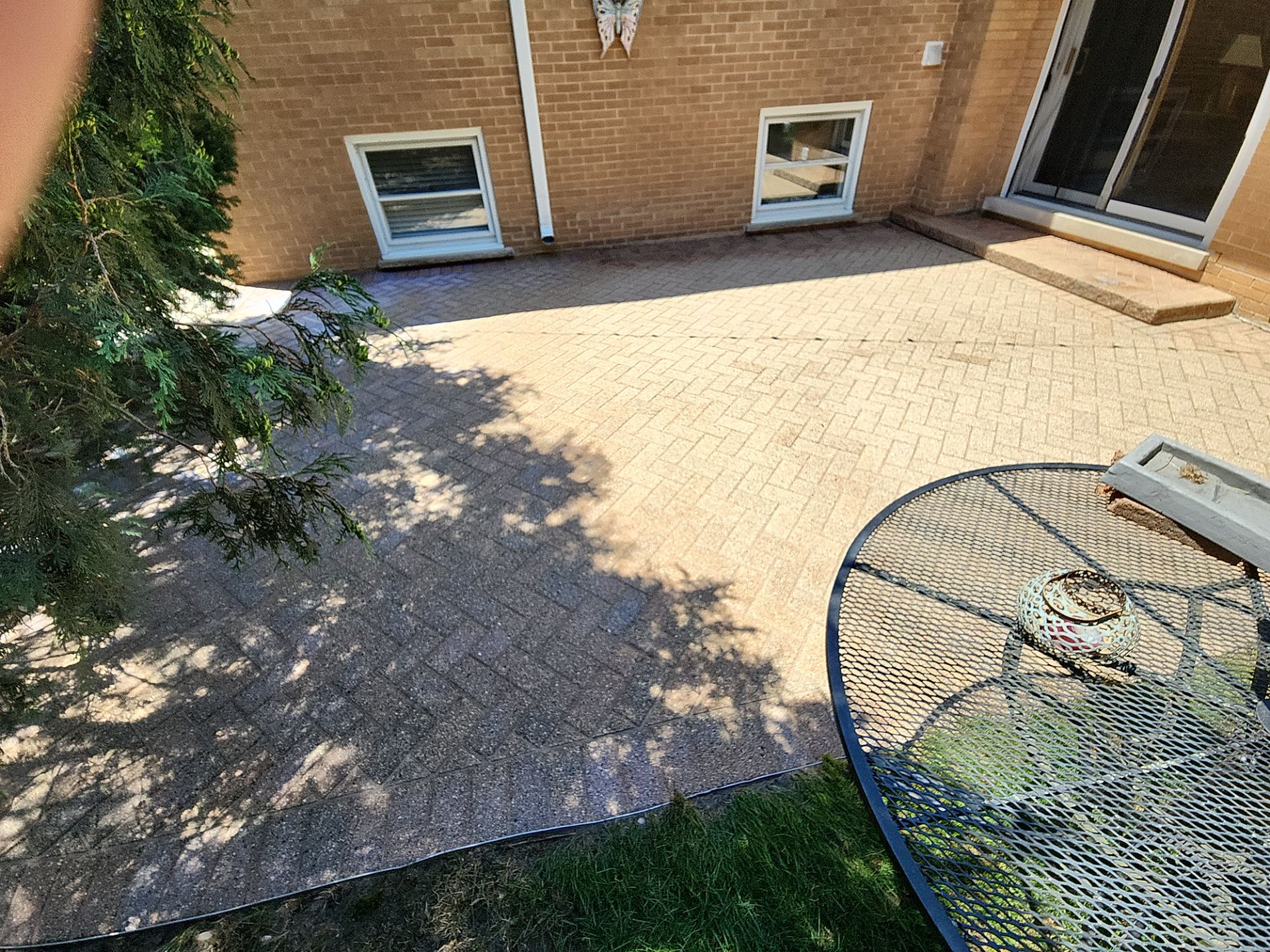Brick paver cleaning  by Northern Power Washing LLC.