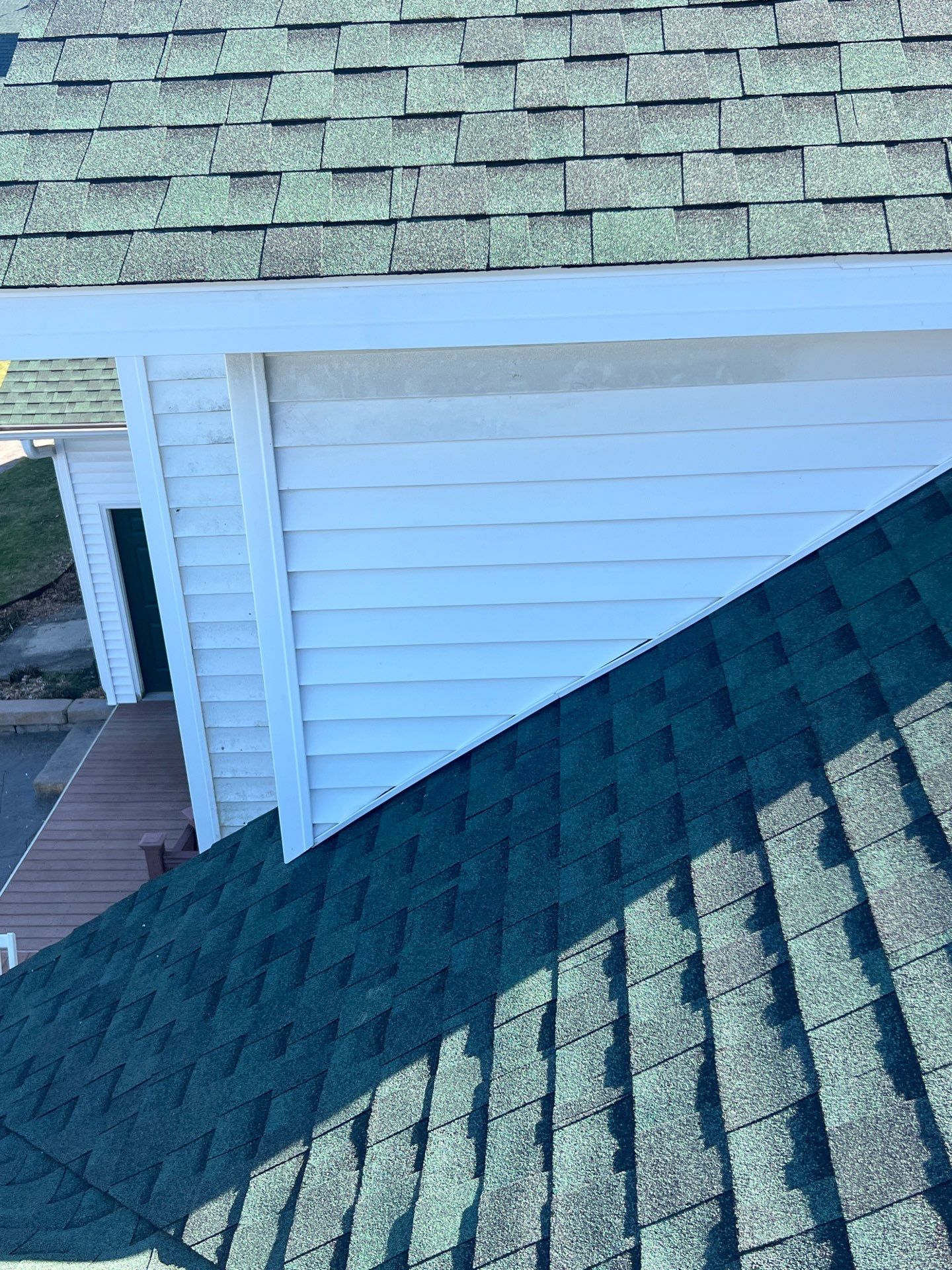 Residential Roofing Replacement with Multiple Skylights in Mason, Michigan by Acme Exteriors