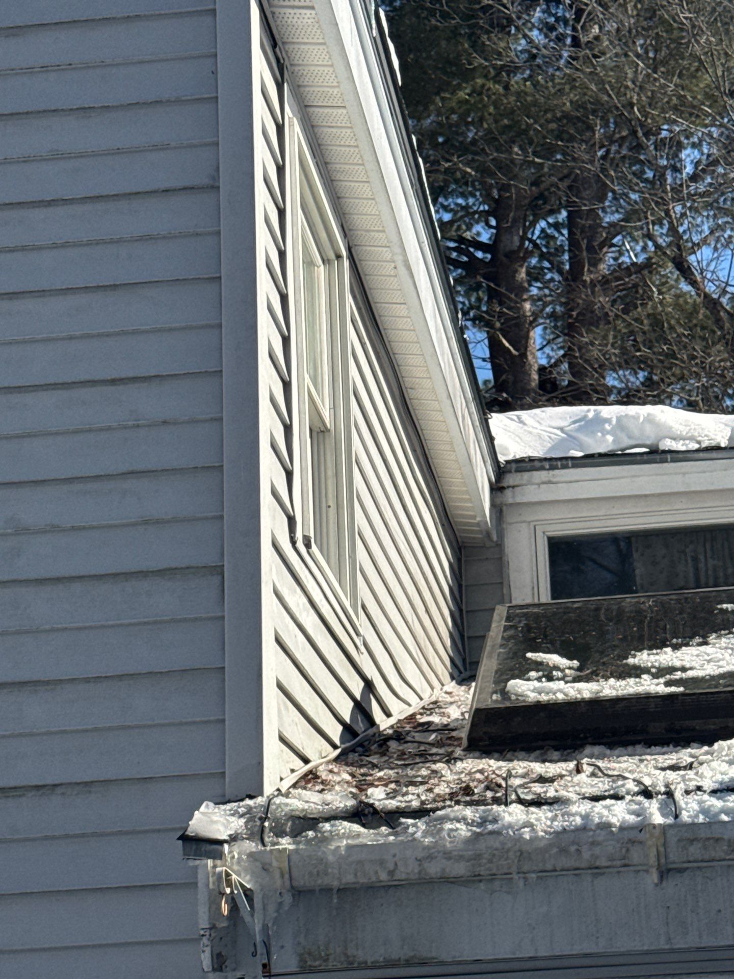 Ice Dam Removal, Snow Removal & Sidewall Flashing Repair in Acton, MA by Mighty Dog Roofing of Greater Middlesex County