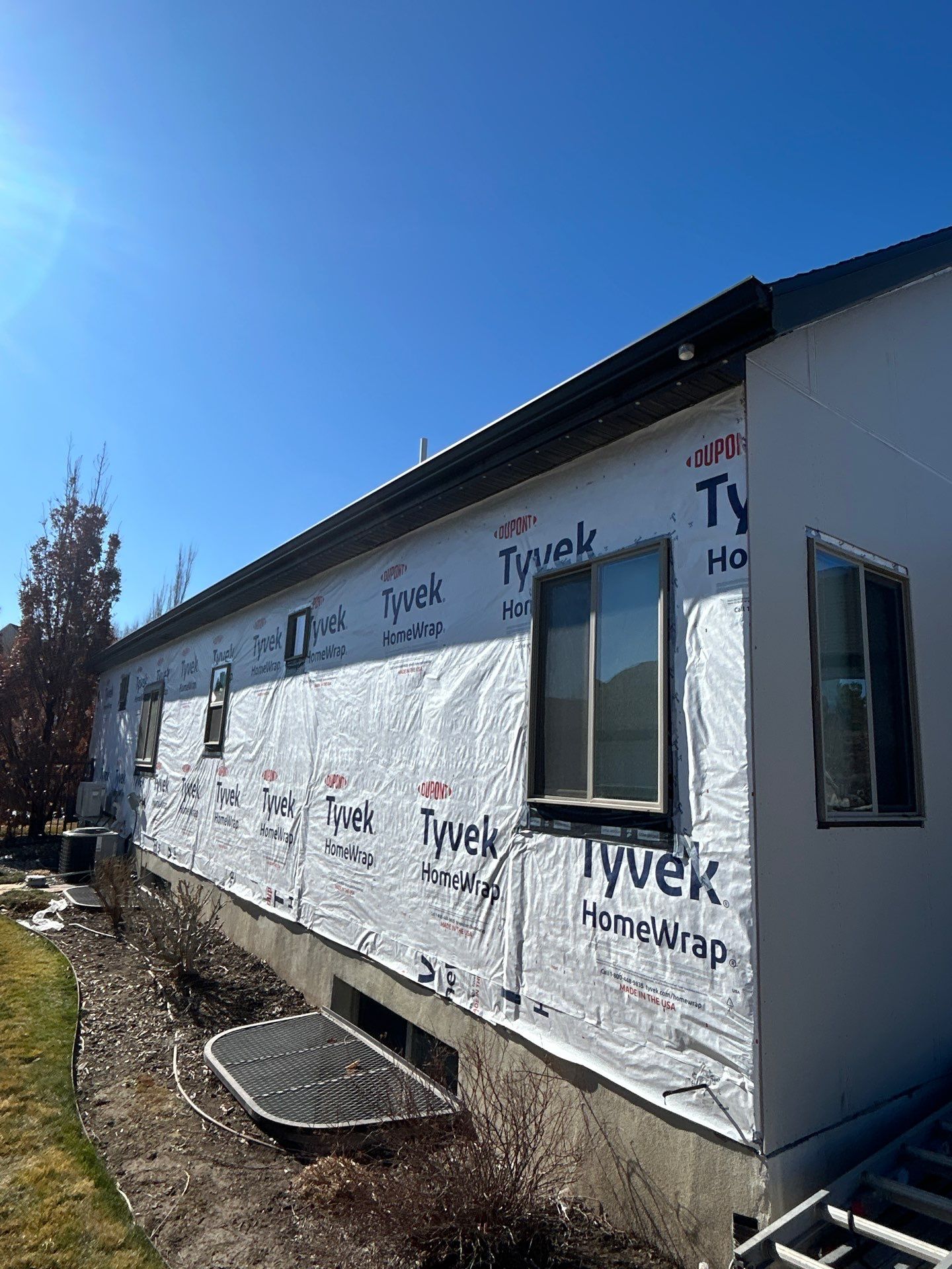 South Jordan | Massive Board & Batten Upgrade | Cobble Stone & Dark Bronze by Ideal Siding Utah